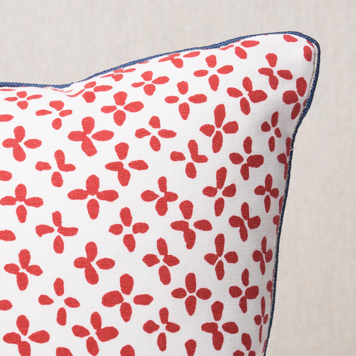 This pillow features Emerson. Inspired by a quatrefoil, Emerson in red is a fun small-scale print with a big personality. Imperfect by design, this casual cotton fabric has a lovely hand-painted feel. Pillow is finished with a welt in Cedric Cotton