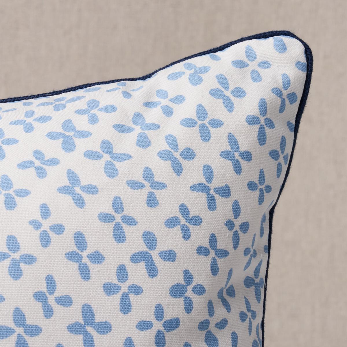 This pillow features Emerson. Inspired by a quatrefoil, Emerson in sky is a fun small-scale print with a big personality. Imperfect by design, this casual cotton fabric has a lovely hand-painted feel. Pillow is finished with a welt in Cedric Cotton