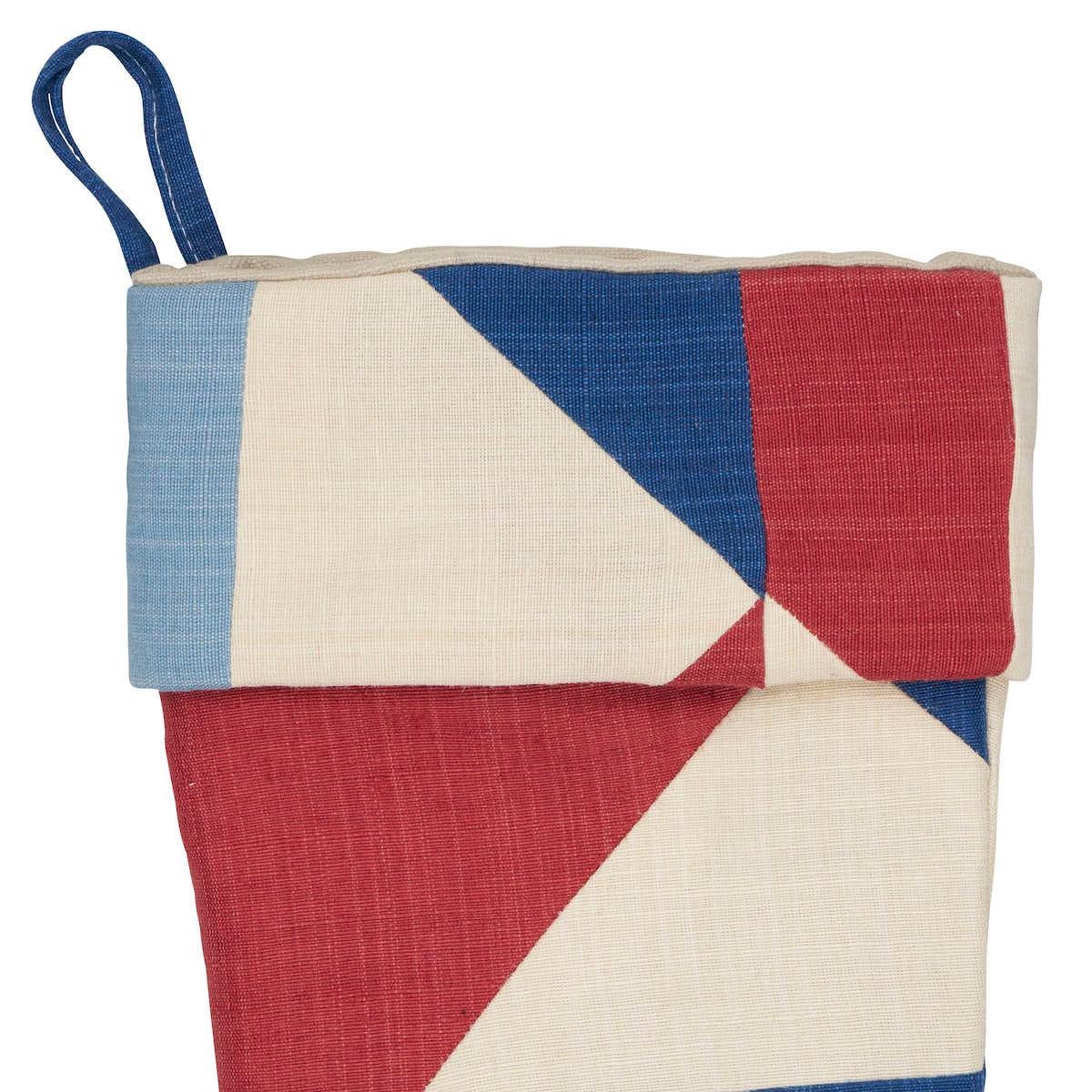 *Pre-order, available to ship in October.

Fashioned from the striking patchwork of Schumacher’s Erindale pattern, this limited-edition holiday stocking is a festive combination of modern and rustic. Made of hand-dyed cotton and jute, the cheerful
