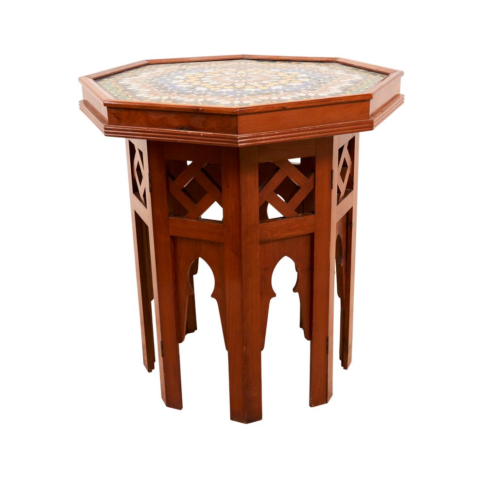 Both Moorish and Arts and Crafts influences play out in the unique design of this 1940s French side table. The octagonal wood base pairs beautifully with the organic colors found in the intricately tiled ceramic top. 


Since Schumacher was founded