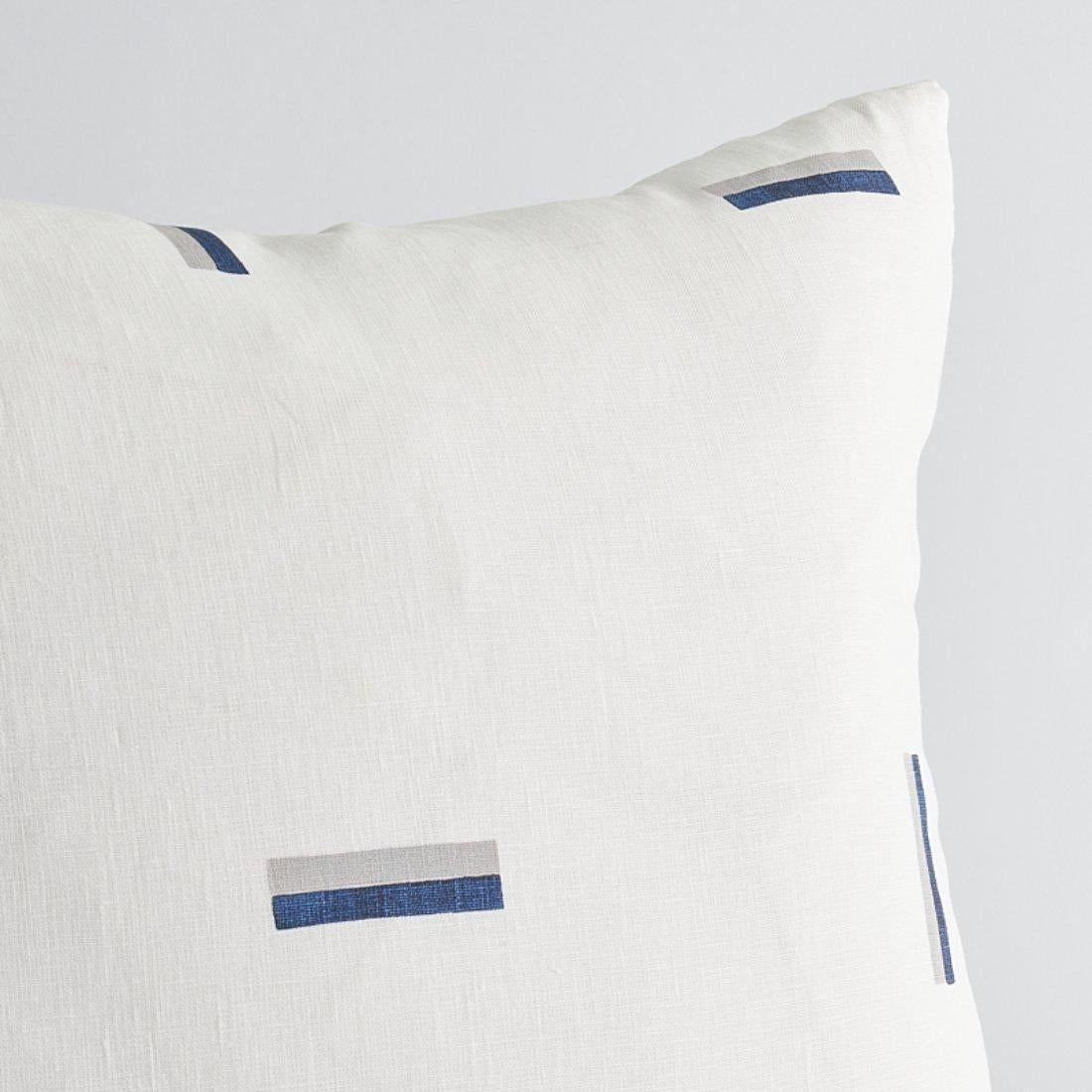 This pillow features Icehouse by Caroline Z Hurley for Schumacher with a knife edge finish. Inspired by a picturesque pond on Martha's Vineyard, this hand-blocked Caroline Z Hurley design is a true work of art, created by artisans in New Bedford,