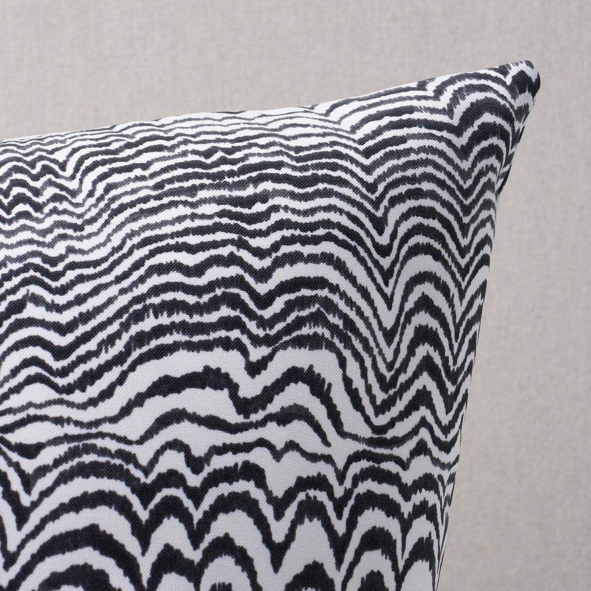 This pillow features Ink Wave Print Indoor/Outdoor by Trina Turk with a knife edge finish. With its unique rippled pattern and watery tones, Ink Wave Print Indoor/Outdoor fabric makes a fabulous statement wherever it goes. Pillow includes a polyfill