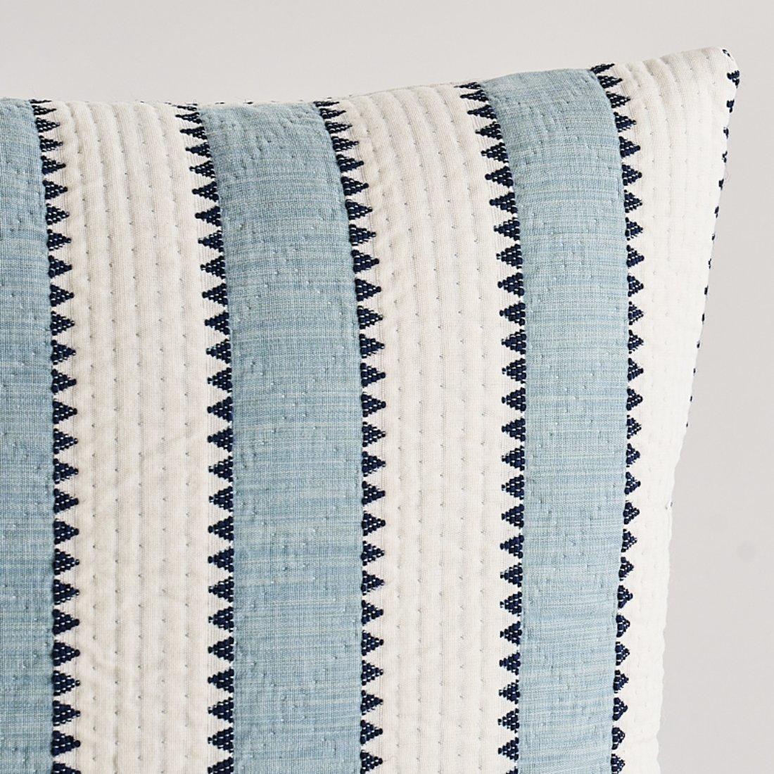This pillow features Isolde Stripe with a Knife Edge finish. Isolde Stripe is a graphic sawtooth stripe matelassé that's just the right proportion for any kind of upholstery. Pillow includes a feather/down fill insert and hidden zipper