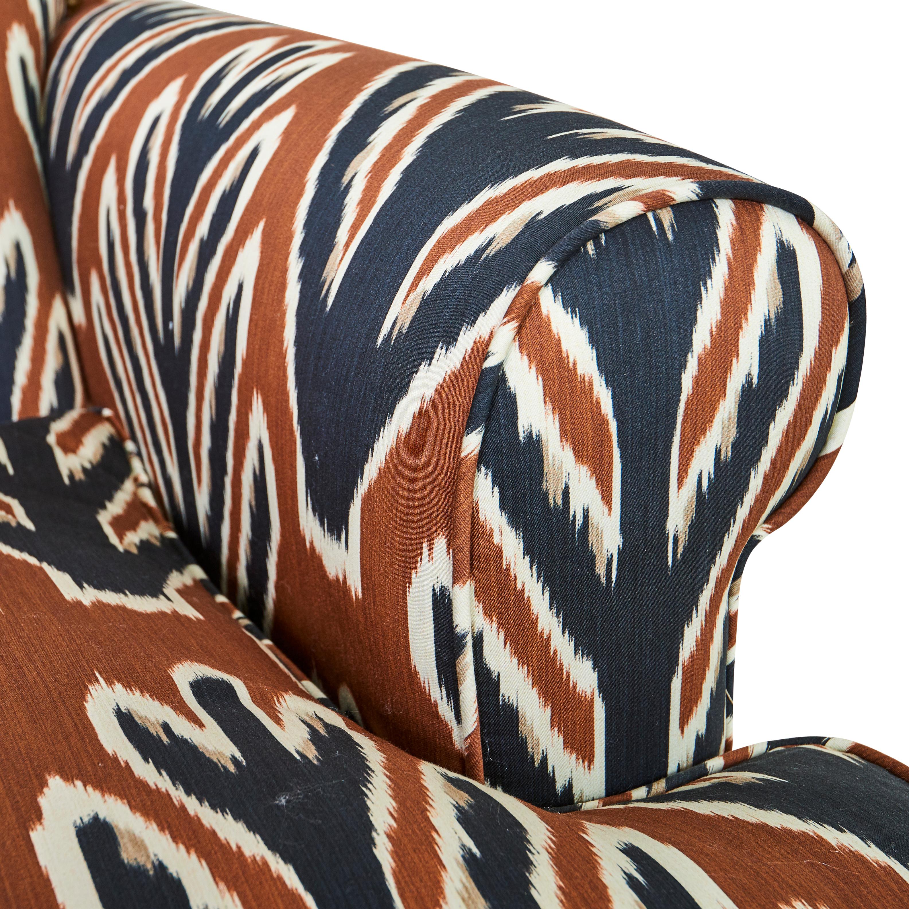 This arm chair is upholstered in Johnson Hartig/Libertine for Schumacher Bodhi Tree fabric in Brown&Black (178562).

