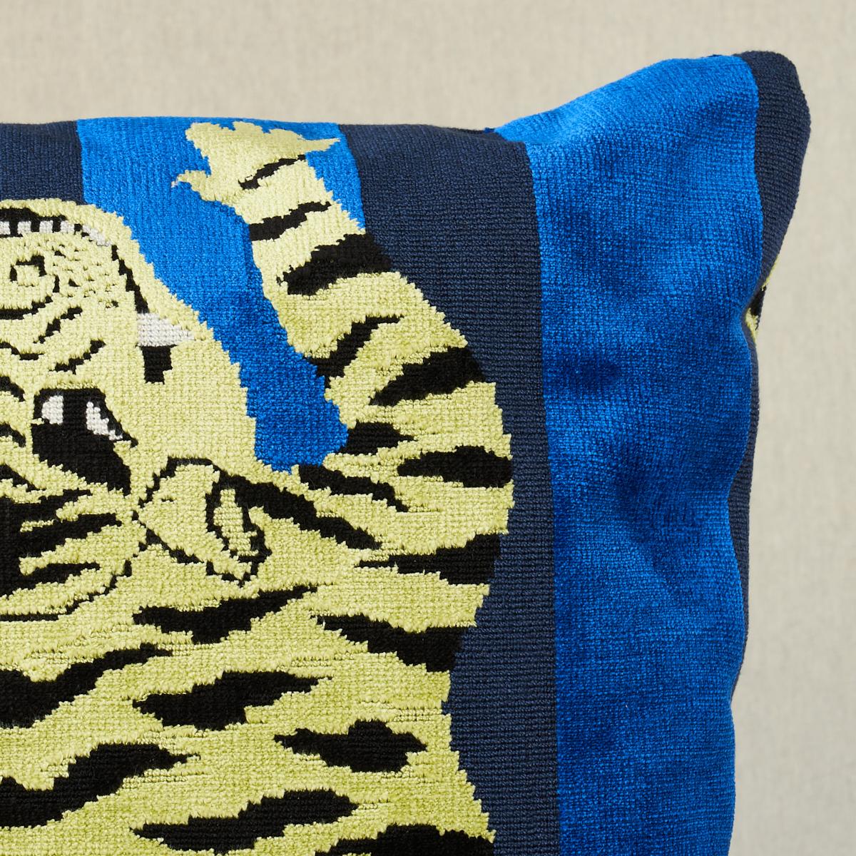 This pillow features Jokhang Tiger Velvet by Johnson Hartig/Libertine for Schumacher with a knife edge finish. Designed by Johnson Hartig, the Tibetan tiger motif is recast as a multi-dimensional stripe on a lush velvet that can easily work in a