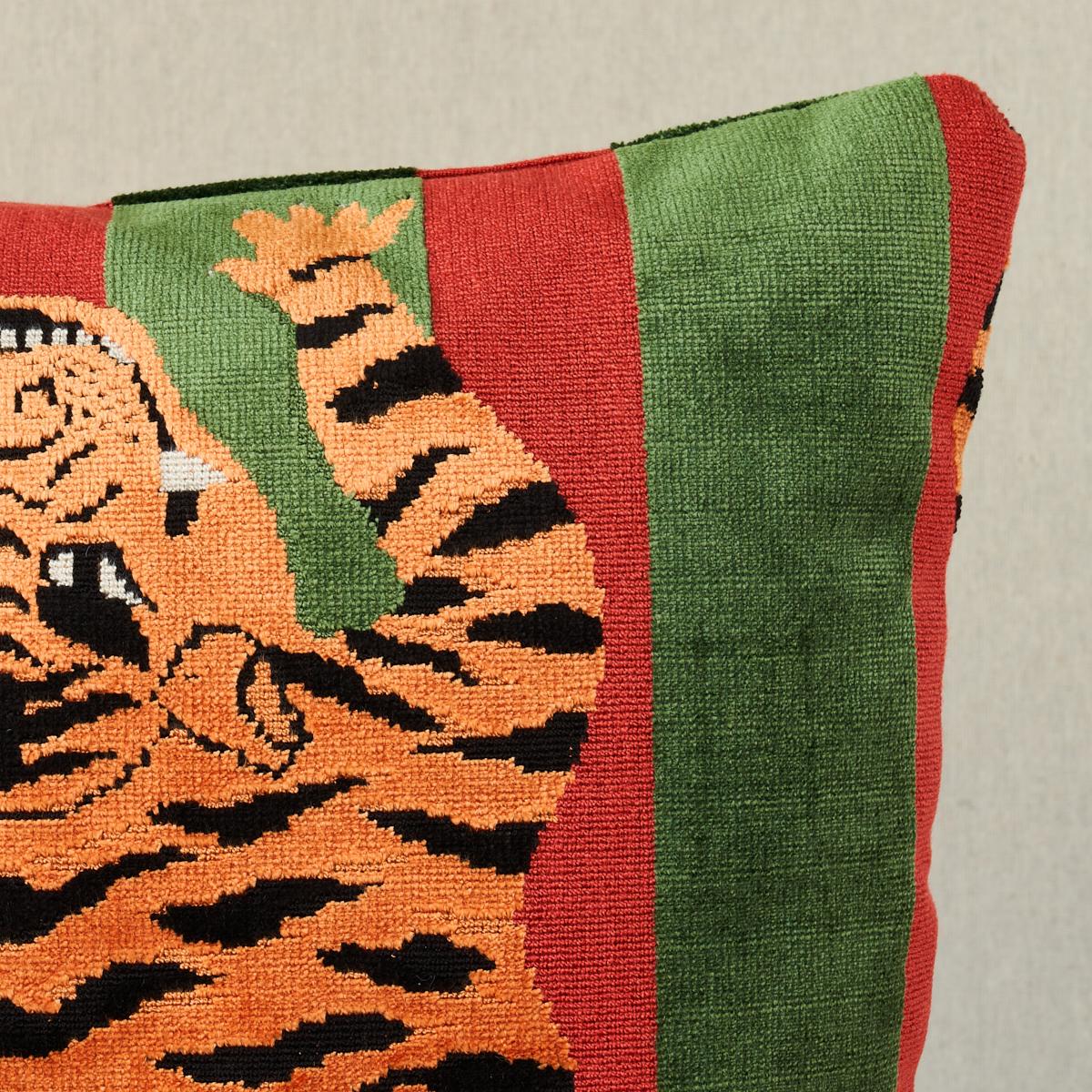 This pillow features Jokhang Tiger Velvet by Johnson Hartig/Libertine for Schumacher with a knife edge finish. Designed by Johnson Hartig, the Tibetan tiger motif is recast as a multi-dimensional stripe on a lush velvet that can easily work in a