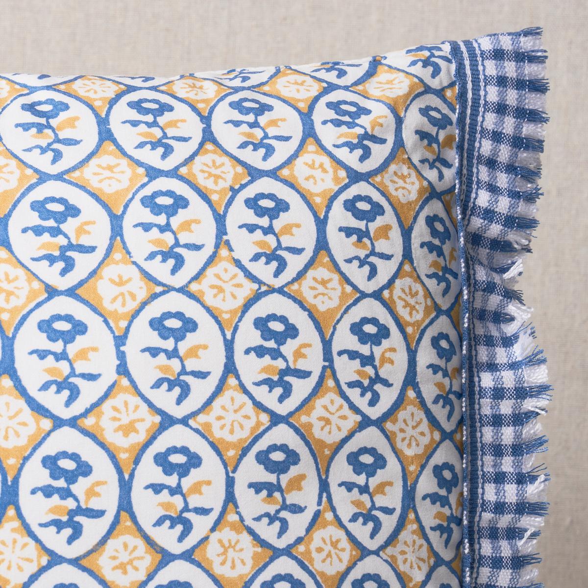 This pillow features Josiane Floral with a knife edge finish on top and bottom. A sweet small-scale flower design, Josiane Floral in yellow-and-blue evokes the imperfect beauty of hand-printed textiles. Sides of pillow are finished with Rosaly Tape,