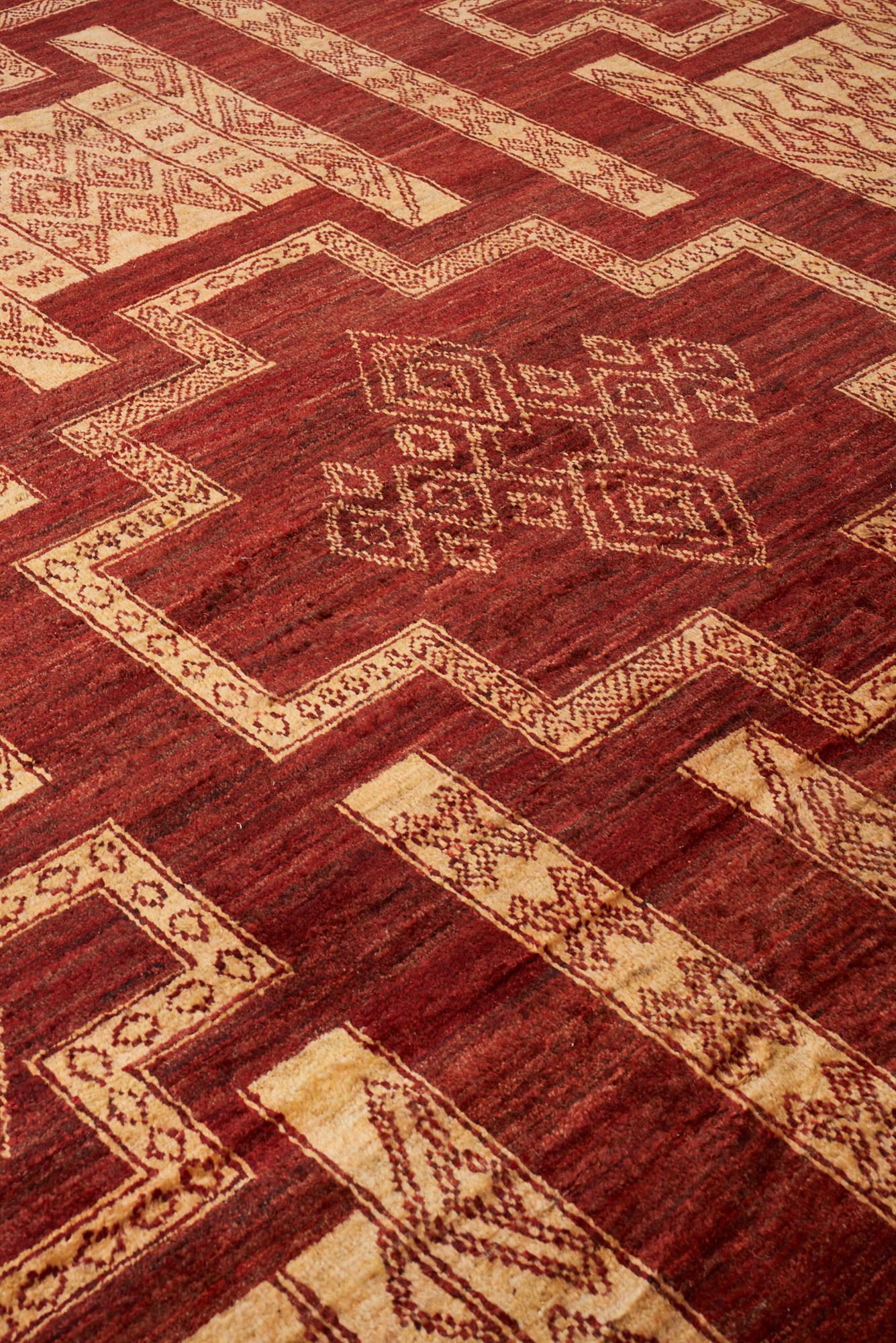 Lose yourself in the rich colors and intricate designs of the Arua collection. Inspired by the most resilient desert dwellers of the Saharas, these hand-knotted rugs are made with wool from the highlands of Afghanistan. Traditional tribal symbols