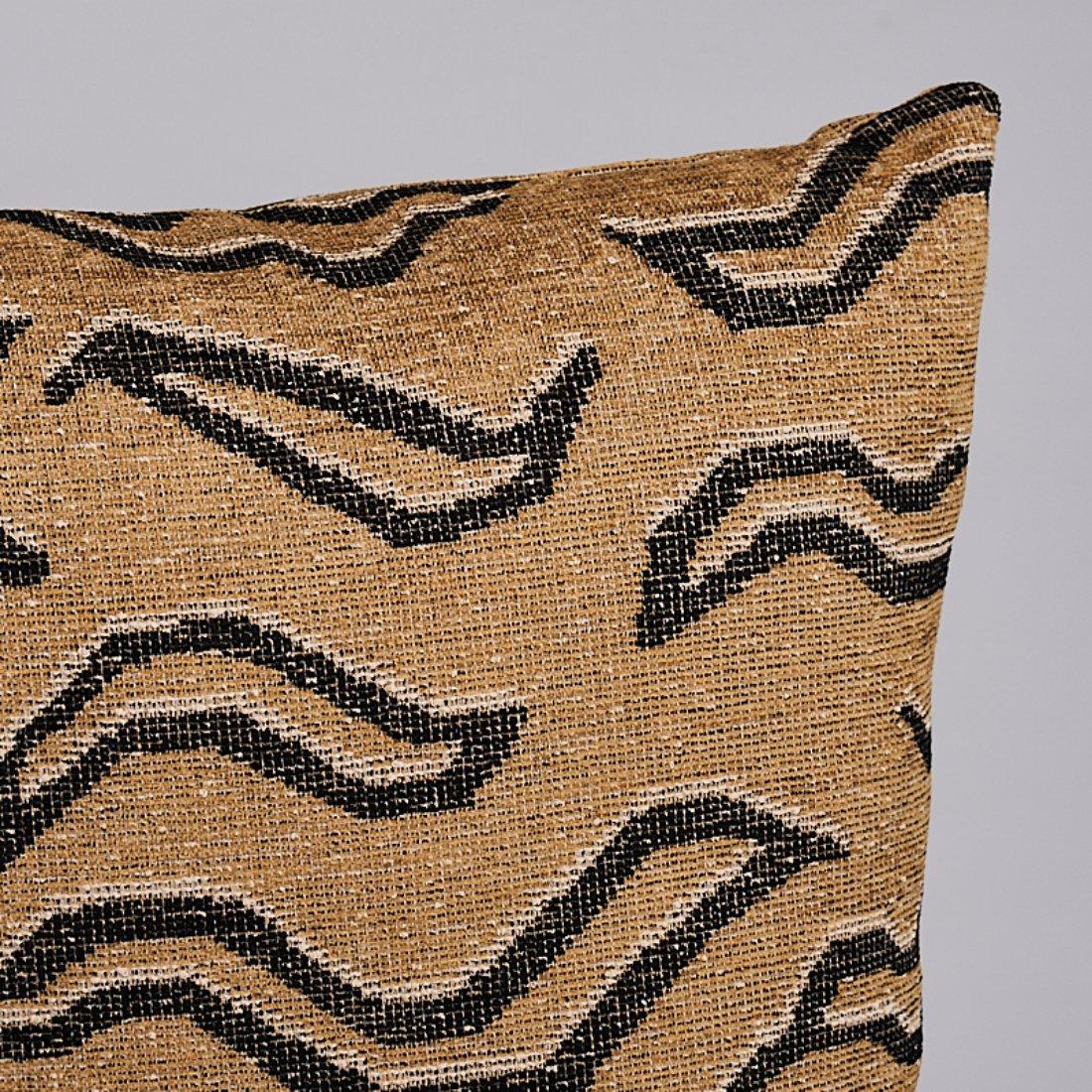 This pillow features Kata with a knife edge finish. An abstract take on a Tibetan tiger pattern, denim-colored Kata is a fabulous, upholstery weight, flat weave fabric with a little chenille for a soft touch. It is a mid-scale, allover pattern with