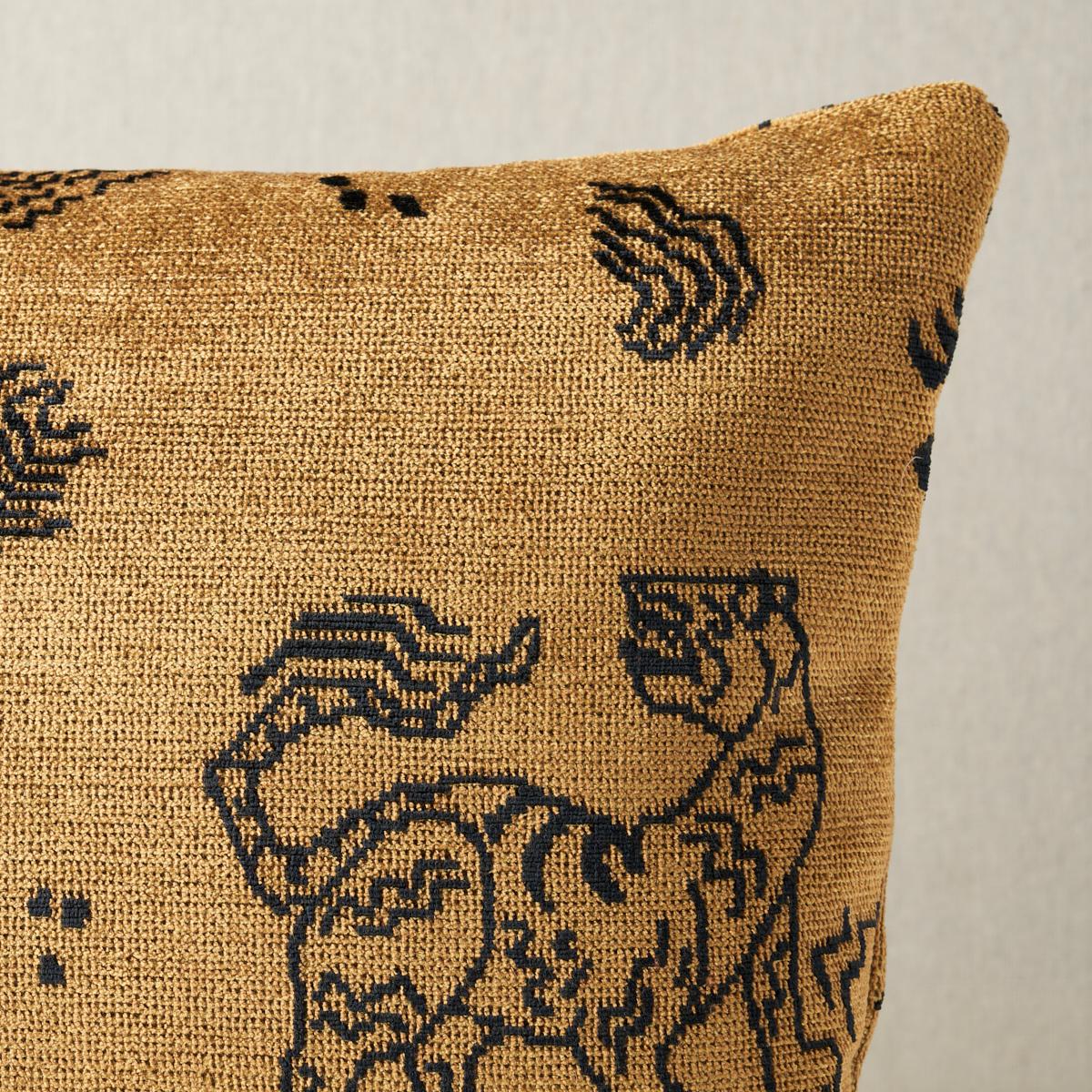 This pillow features Kinabalu Velvet with a knife edge finish. Featuring abstracted tiger motifs and a dense, shimmery pile, Kinabalu Velvet in gold was inspired by antique Tibetan carpet designs. Pillow includes a feather/down fill insert and