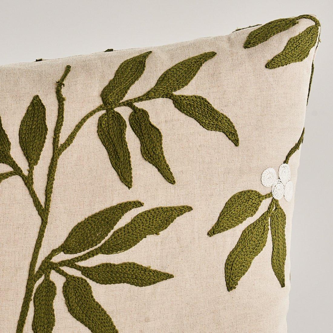 This pillow features Lilla Embroidery with a knife edge finish. With uncommonly large (nearly 11”) motifs, Lilla Embroidery in olive-on-neutral is a traditional design with modern leanings. The cotton-and-linen fabric is embroidered with a