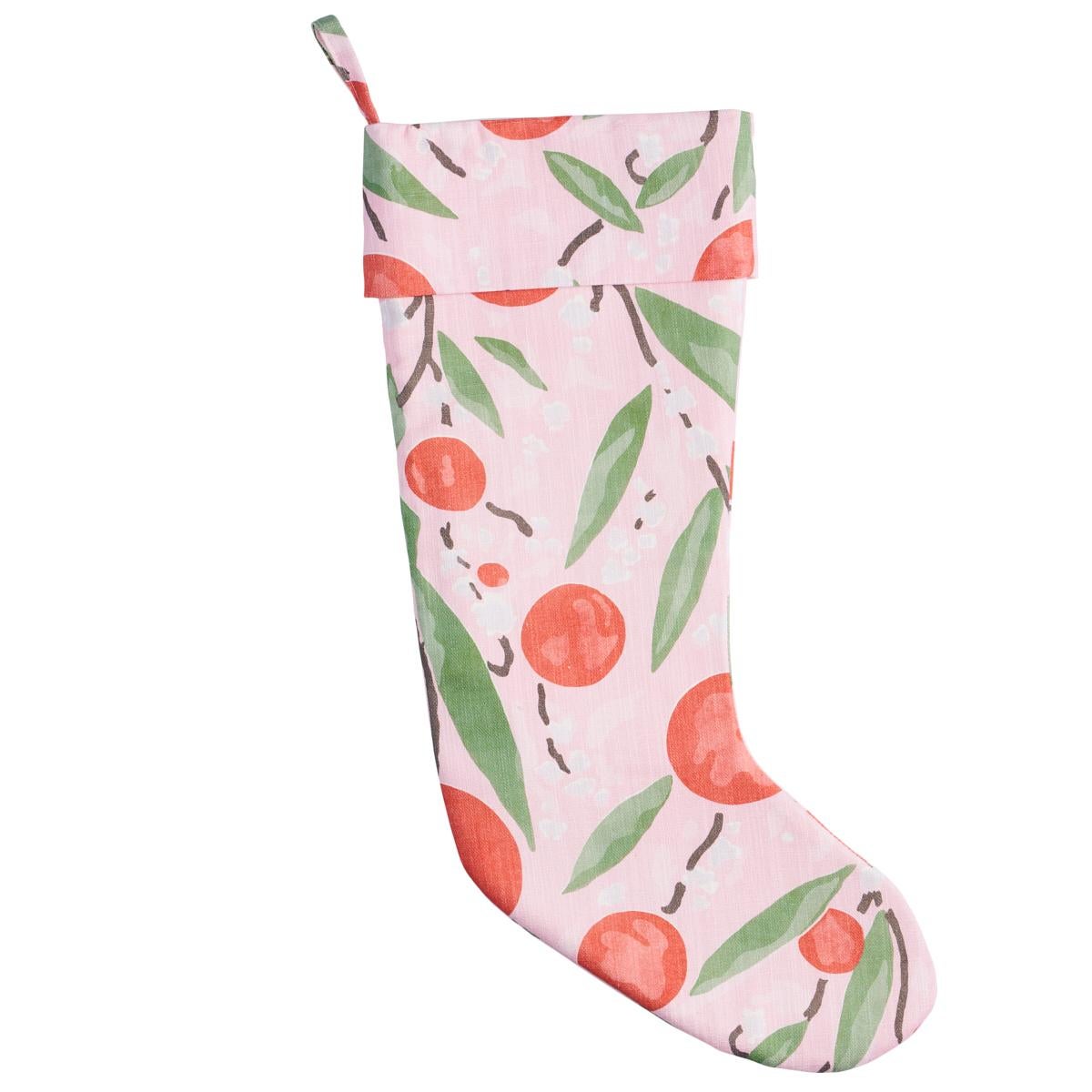 Cheerful lollipop flowers and stylized leaves give this limited-edition holiday stocking a fresh, contemporary feel. Fashioned out of Schumacher’s Mirabelle fabric, a delightful 1920s pattern with a painterly warmth, it’s lined with a cotton-linen