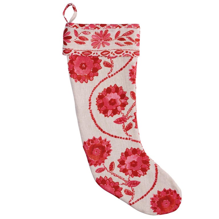 This not-quite-conventional limited-edition holiday stocking takes red in a different direction with Schumacher’s Zinnia Handmade Print, a meandering floral that’s hand-printed on linen and says “charm” with a capital C. We’ve lined it with a
