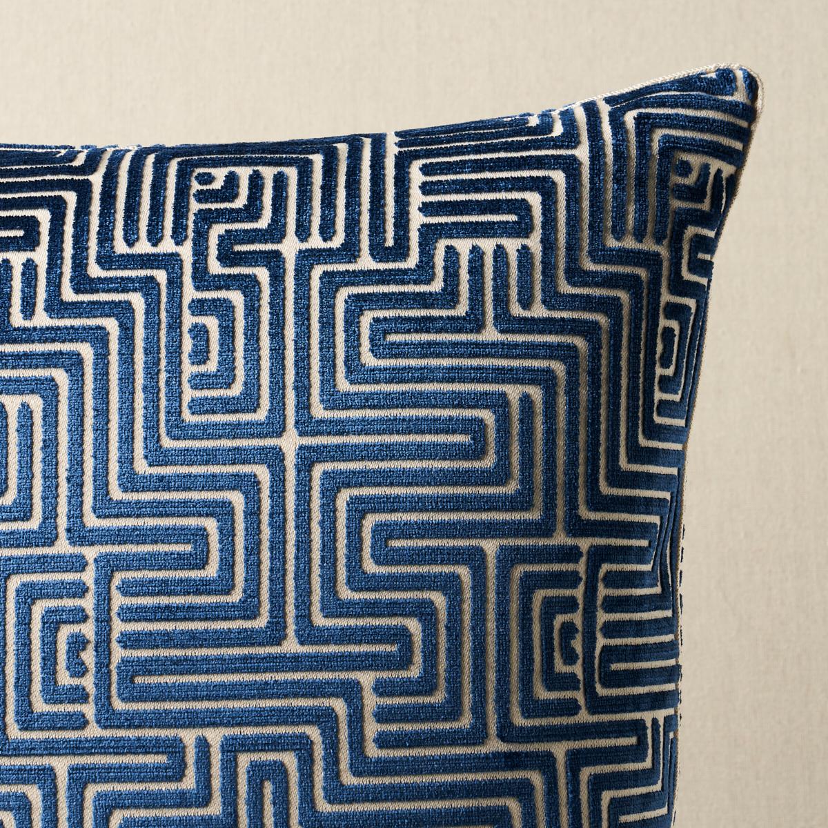This pillow features Lisboa Velvet. This unique, labyrinthine pattern was inspired by Portuguese tilework. Its winding, linear motif has a striking, large scale and a subtle, metallic sheen. Pillow is finished with a welt in Gustave Silk Lip Cord.