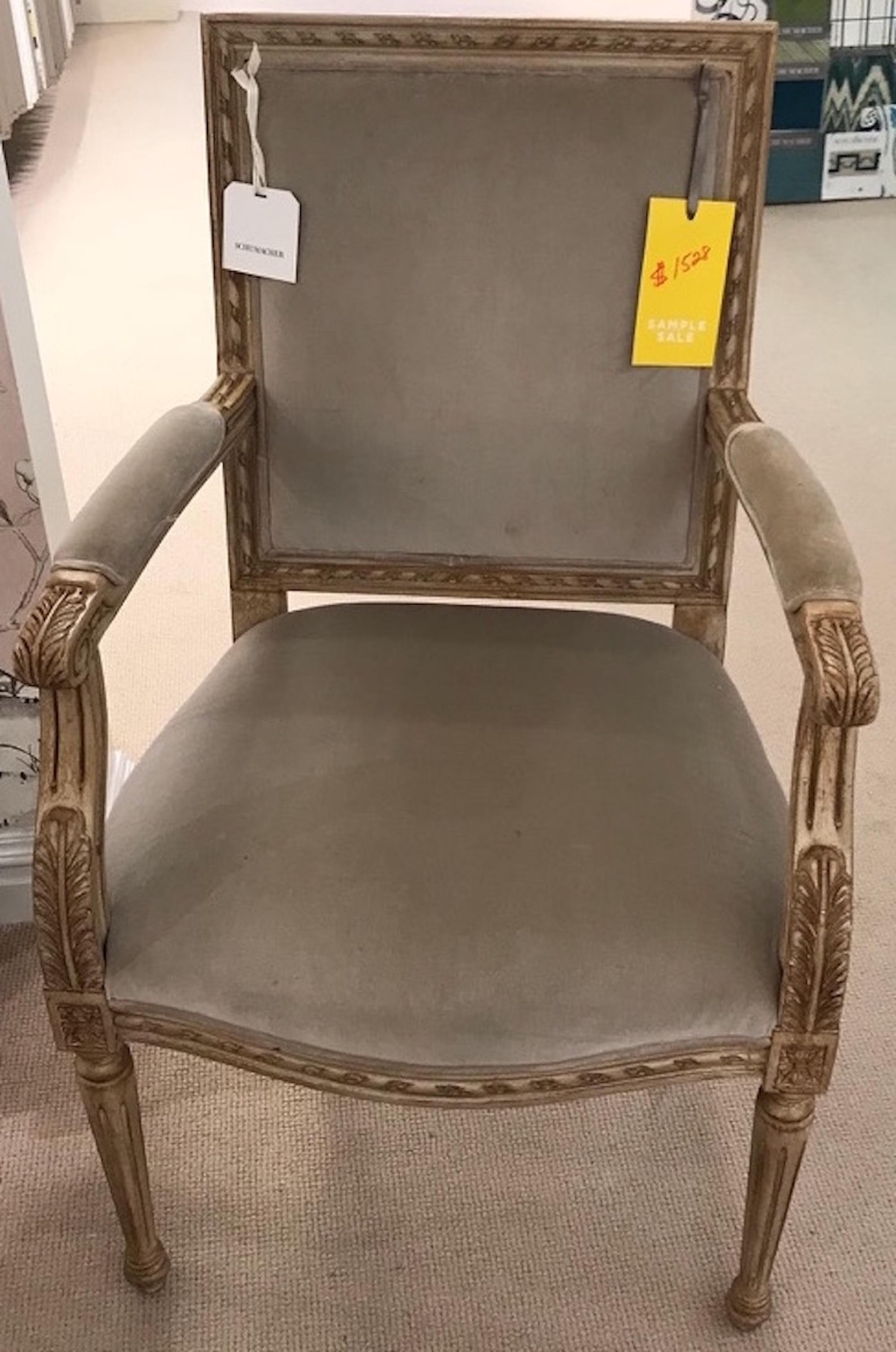 This exquisite Schumacher French Louis XVI side chair features a Classic frame, hand carved from European beechwood. Upholstered with a gorgeous Schumacher fabric woven in the Netherlands, Gainsborough Velvet gives the chair a sumptous texture. The