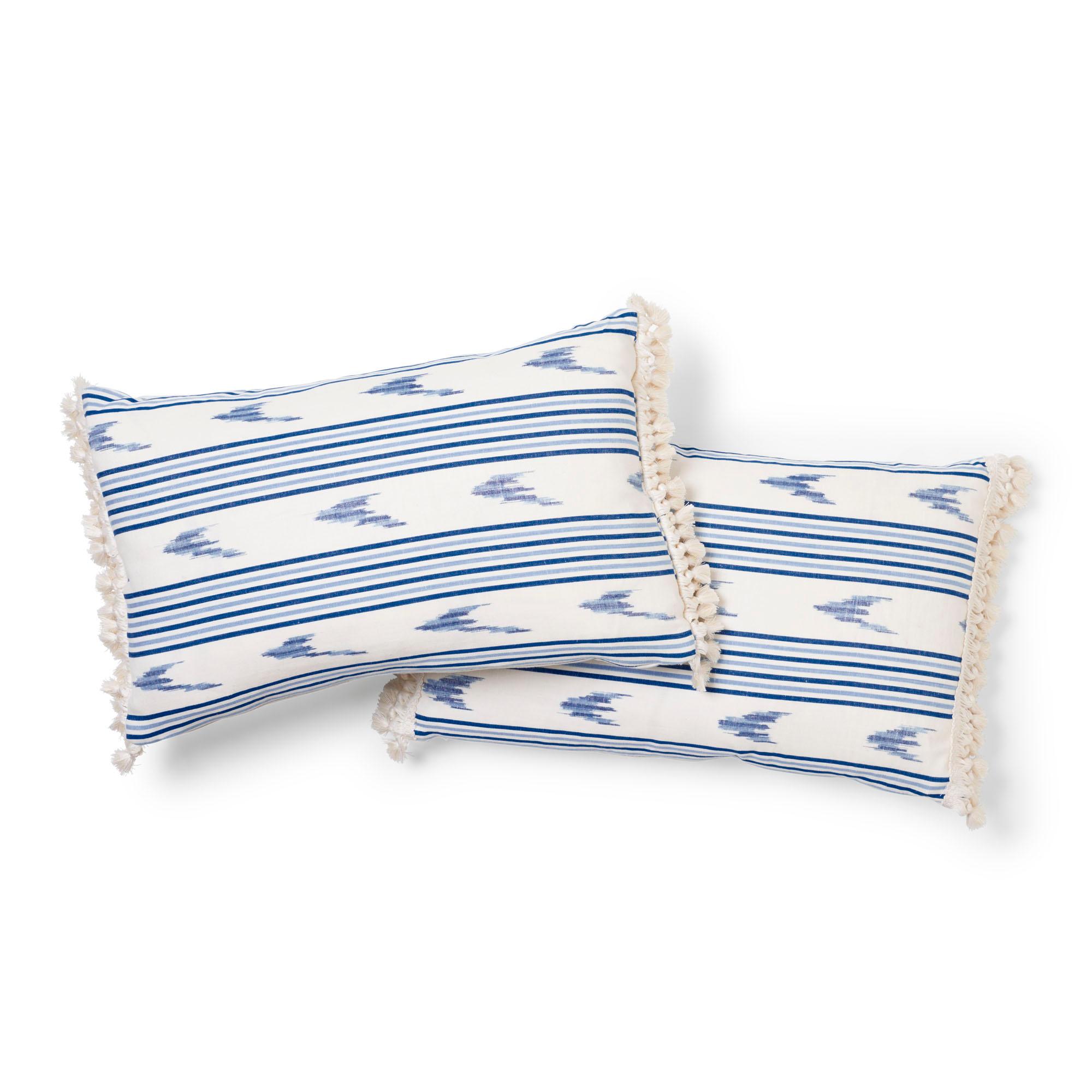 This pillow showcases Santa Barbara Ikat in Indigo, a true warp-printed and woven ikat. This unique medium-scale stripe is remarkable on its own, but is also a wonderful companion to larger and smaller patterns. Feather/down fill insert included;