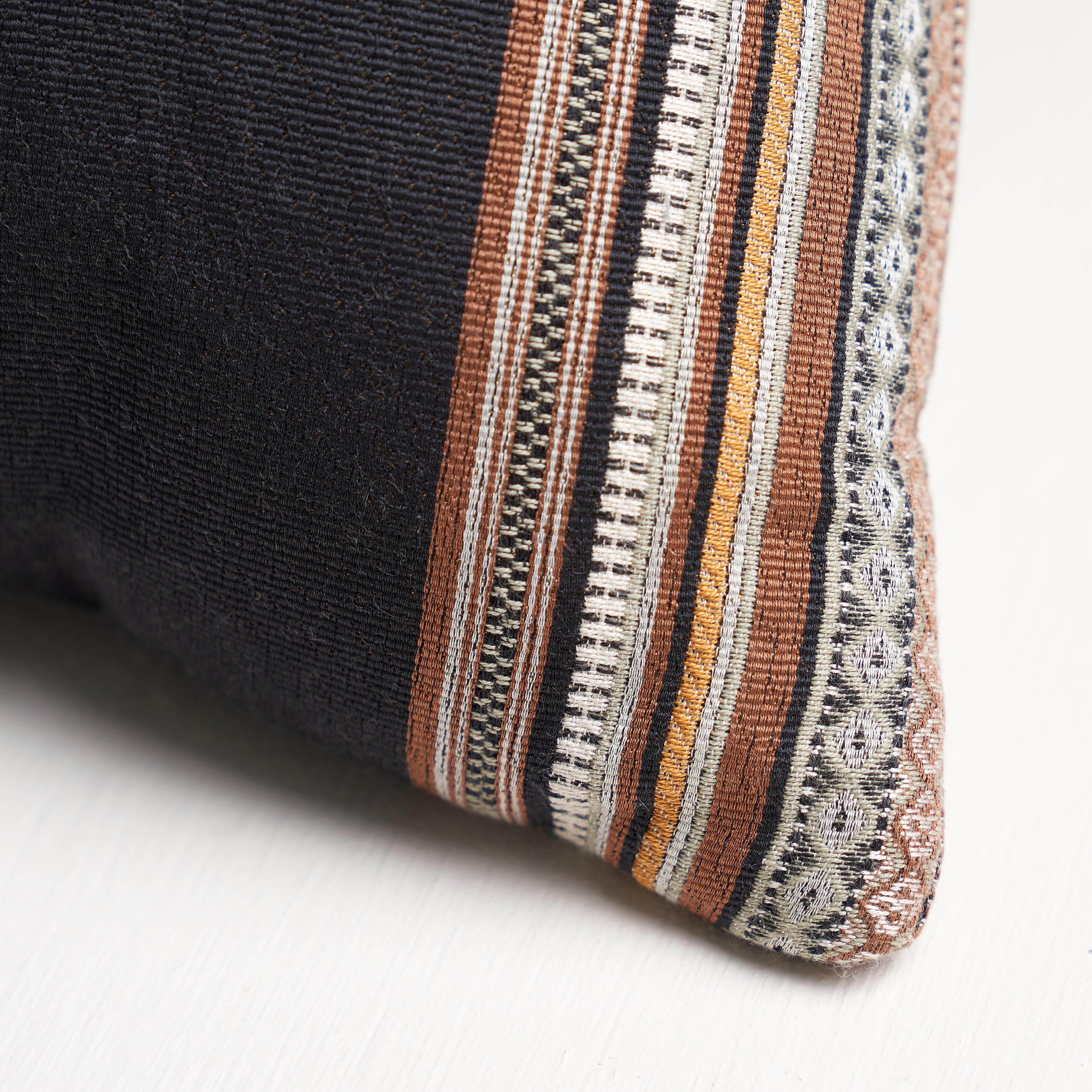 This pillow features Markova Stripe with a knife edge finish. This elaborately detailed, multi-color showstopper is the perfect upholstery weight stripe. It‚Äôs a wonderfully pattern in an easy-to-use scale that will add a note of drama to any room.