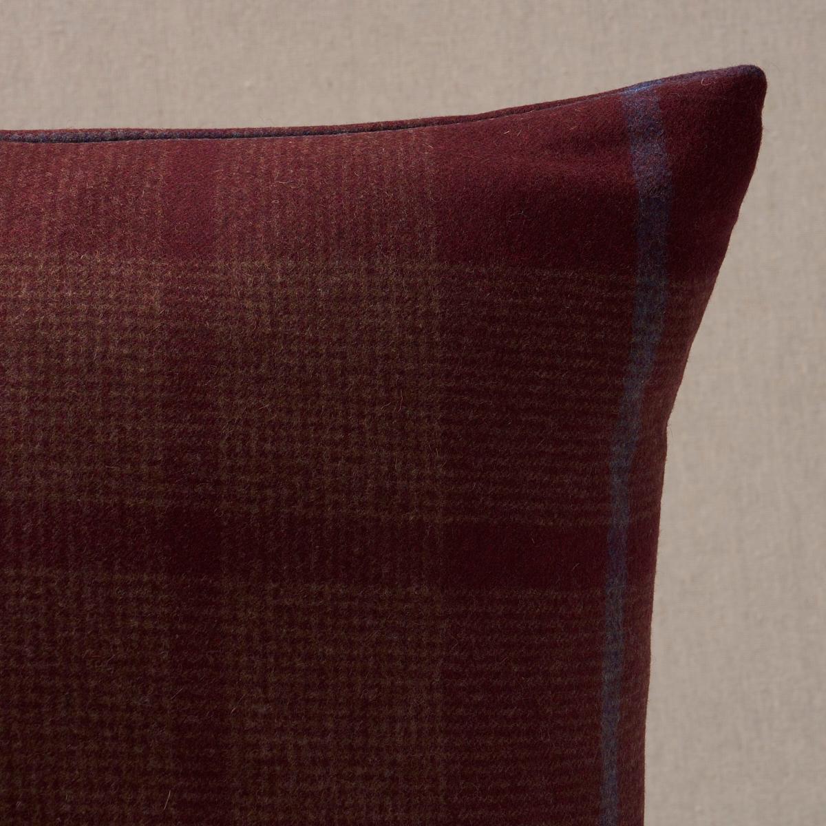 This pillow features Montana Wool Plaid with a knife edge finish. Montana Wool Plaid in burgundy is a fine, tightly woven houndstooth check with an overstripe that adds lovely depth and a touch of contrast. Pillow includes a feather/down fill insert