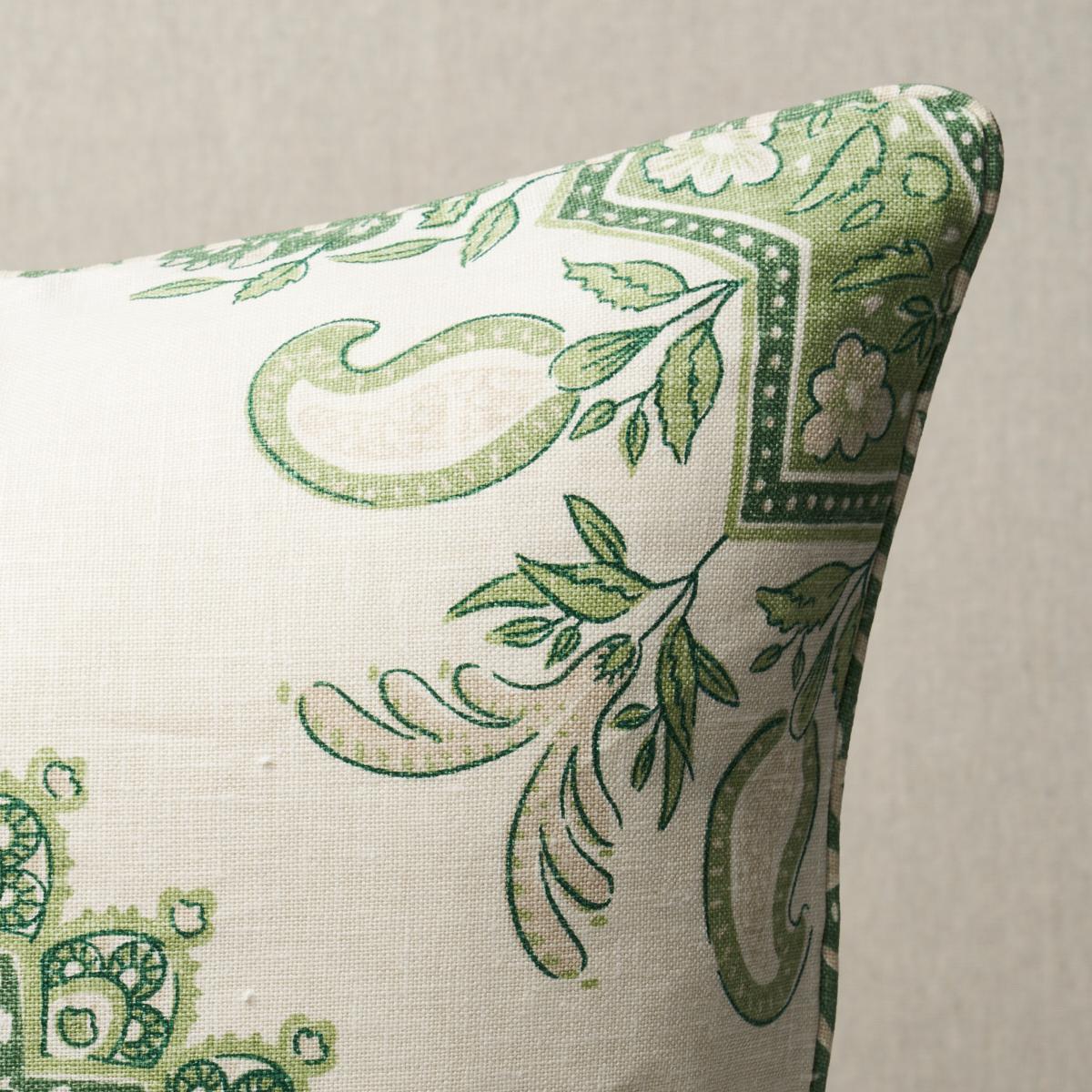 This pillow features Montecito Medallion by Mark D. Sikes for Schumacher with a self welt finish. This stunning large-scale medallion in leaf green evokes timeless motifs from India and Turkey for a chic, global vibe. Pillow includes a feather/down