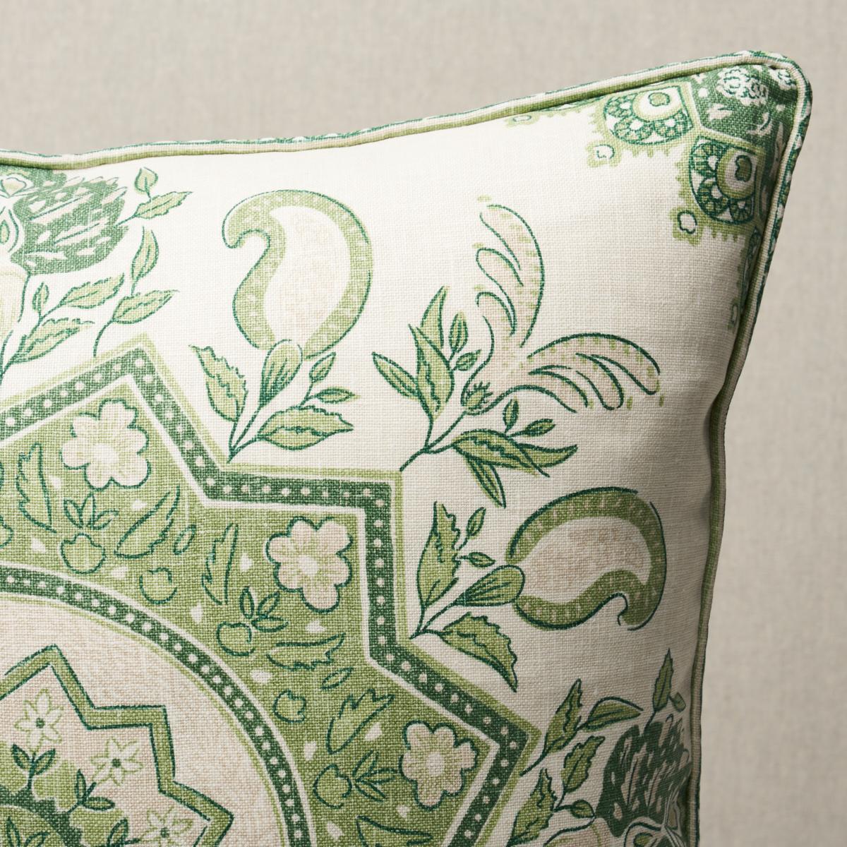 This pillow features Montecito Medallion by Mark D. Sikes for Schumacher with a self welt finish. This stunning large-scale medallion in leaf green evokes timeless motifs from India and Turkey for a chic, global vibe. Pillow includes a feather/down