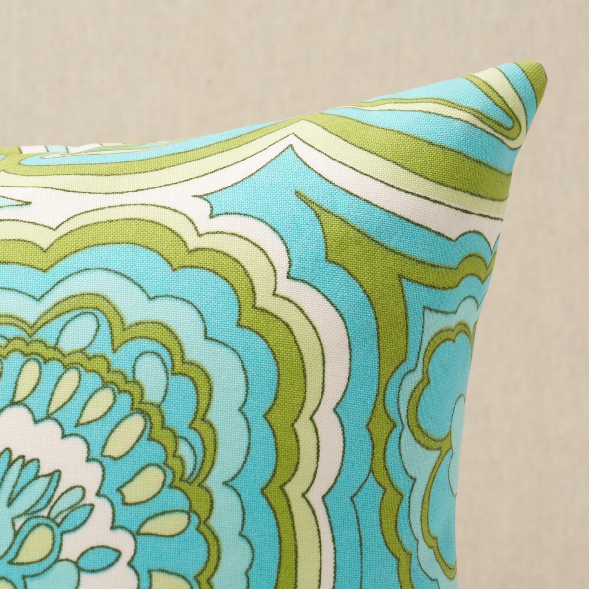 This pillow features Morning Sunrise Indoor/Outdoor by Trina Turk with a knife edge finish. Created by Trina Turk, Morning Sunrise Print Indoor/Outdoor fabric is a fashion-inspired abstract floral with a groovy retro vibe. Pillow includes a polyfill