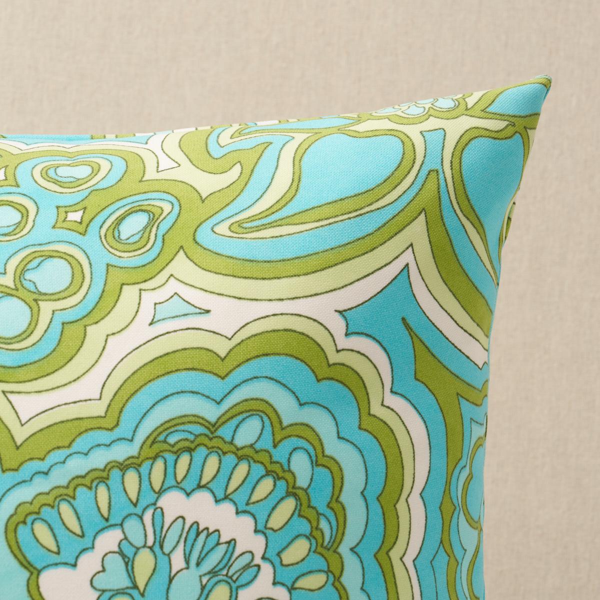 This pillow features Morning Sunrise Indoor/Outdoor by Trina Turk with a knife edge finish. Created by Trina Turk, Morning Sunrise Print Indoor/Outdoor fabric is a fashion-inspired abstract floral with a groovy retro vibe. Pillow includes a polyfill