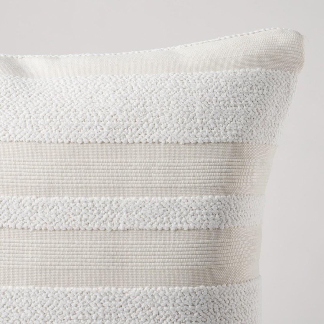 This pillow features Ohara Stripe I/O with a knife edge finish. This next-gen indoor-outdoor fabric is a woven stripe that marries durability with the decadent look and feel of a bouclé. Pillow includes a feather/down fill insert and hidden zipper