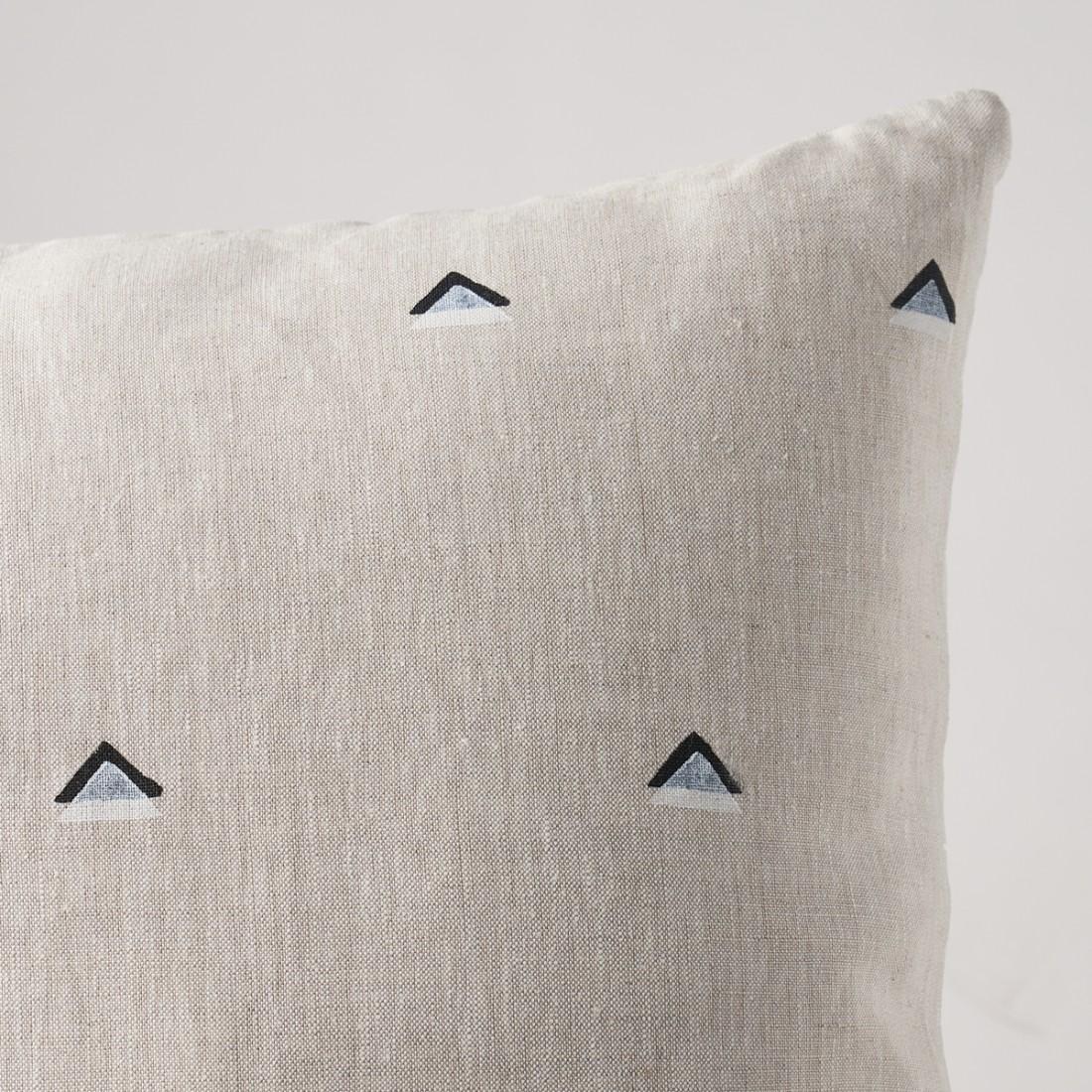 This pillow features Overlapping Triangles by Caroline Z Hurley with a knife edge finish. Designed by Caroline Z Hurley in her Brooklyn studio and block-printed in New Bedford, Massachusetts.. Each shape is cut and individually stamped onto the