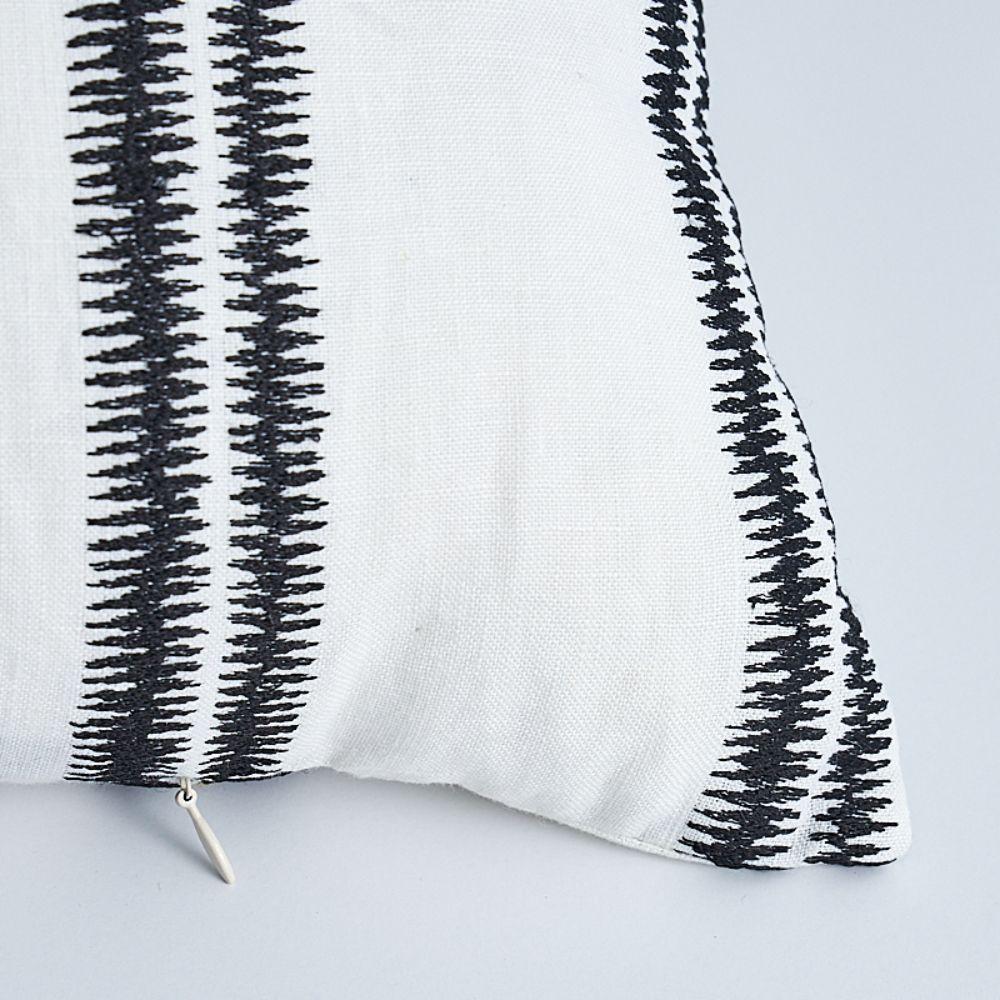 This pillow features Paloma Embroidery with a knife edge finish. A graphic embroidered double stripe makes this cotton-linen weave appealingly modern. Subtle variations are part of its inherent natural beauty. Pillow includes a feather/down fill