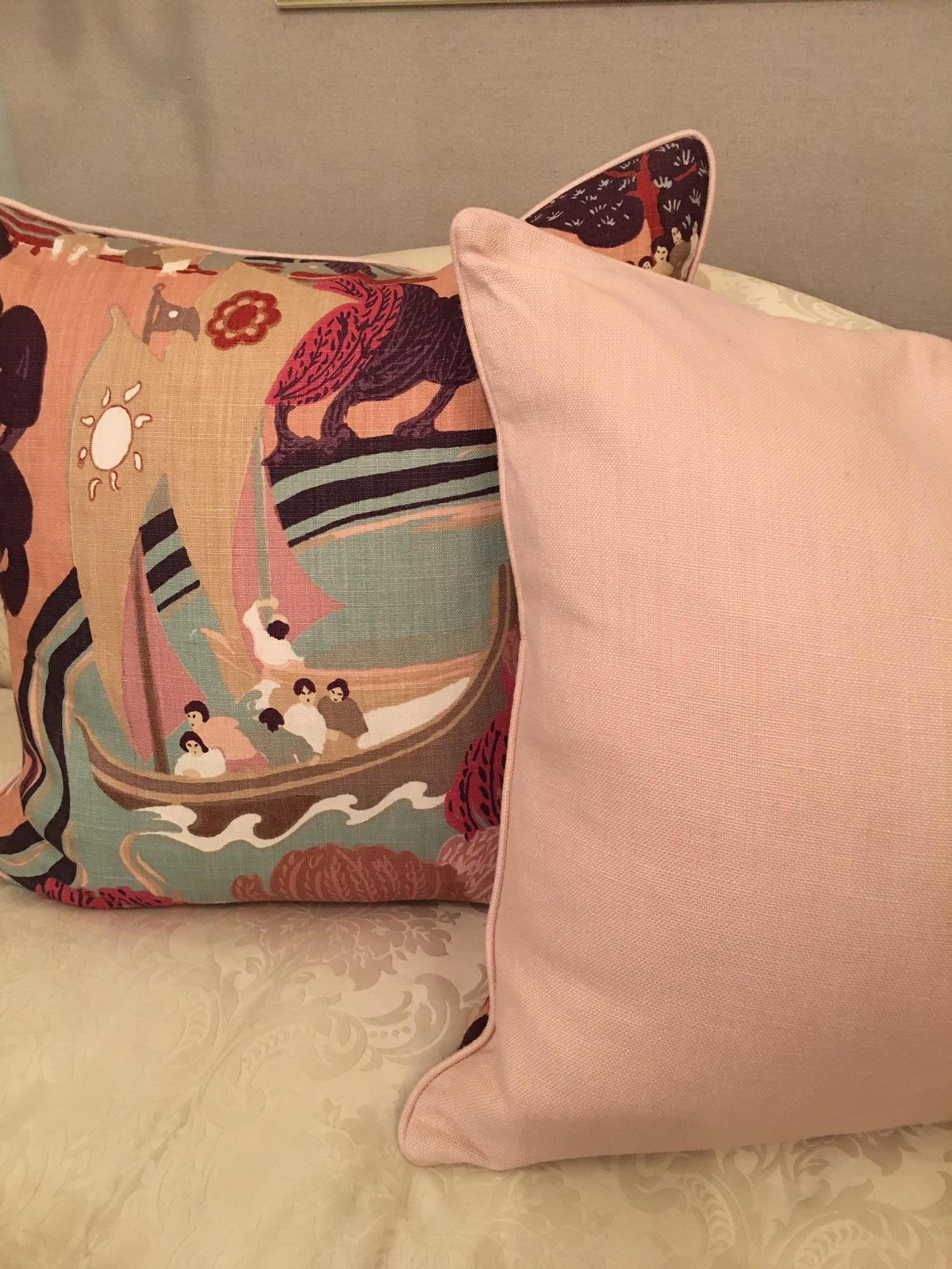 These lovely Schumacher pillows in the coveted Pearl River pattern is set in an appealing color way of rose, salmon, aqua and mocha. They are backed with heavy pale pink linen and filled with down and feather pillows. Plump and cozy, they are 23 x