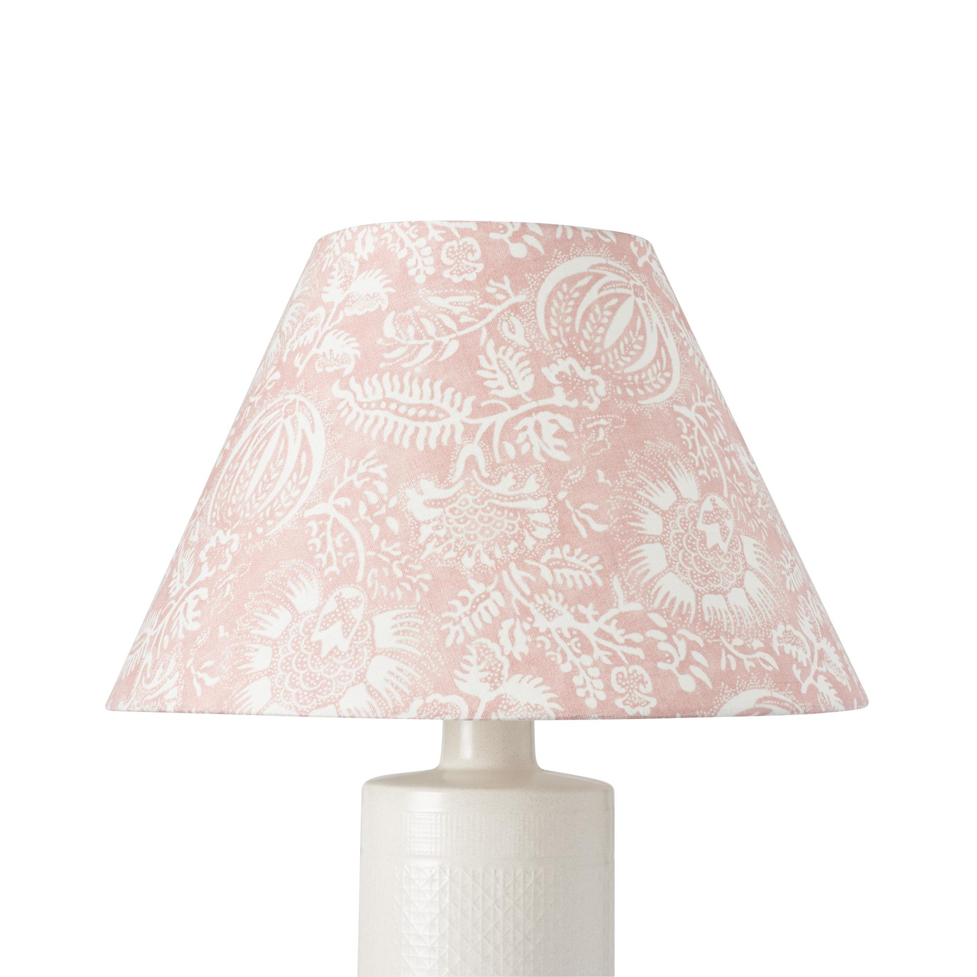 This lampshade features our Pomegranate Print in Petal. This lively pomegranate pattern was inspired by an antique resist print. It's a classic, versatile botanical design with wonderful color variations and textural nuance. Measures: 8