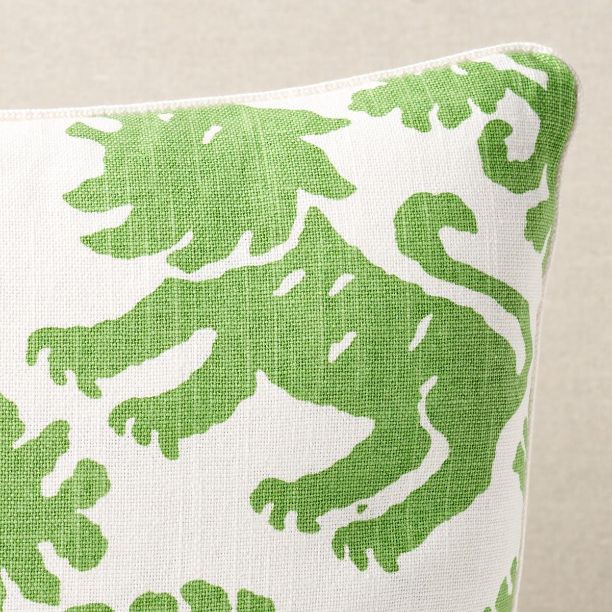 This pillow features Regalia. This artisanal print features mirrored silhouettes of rampant lions and stylized flowers on a textural union cloth ground. Pillow is finished with a welt in Cedric Cotton Lip Cord Narrow. Cord contents: 48% Fibranne,