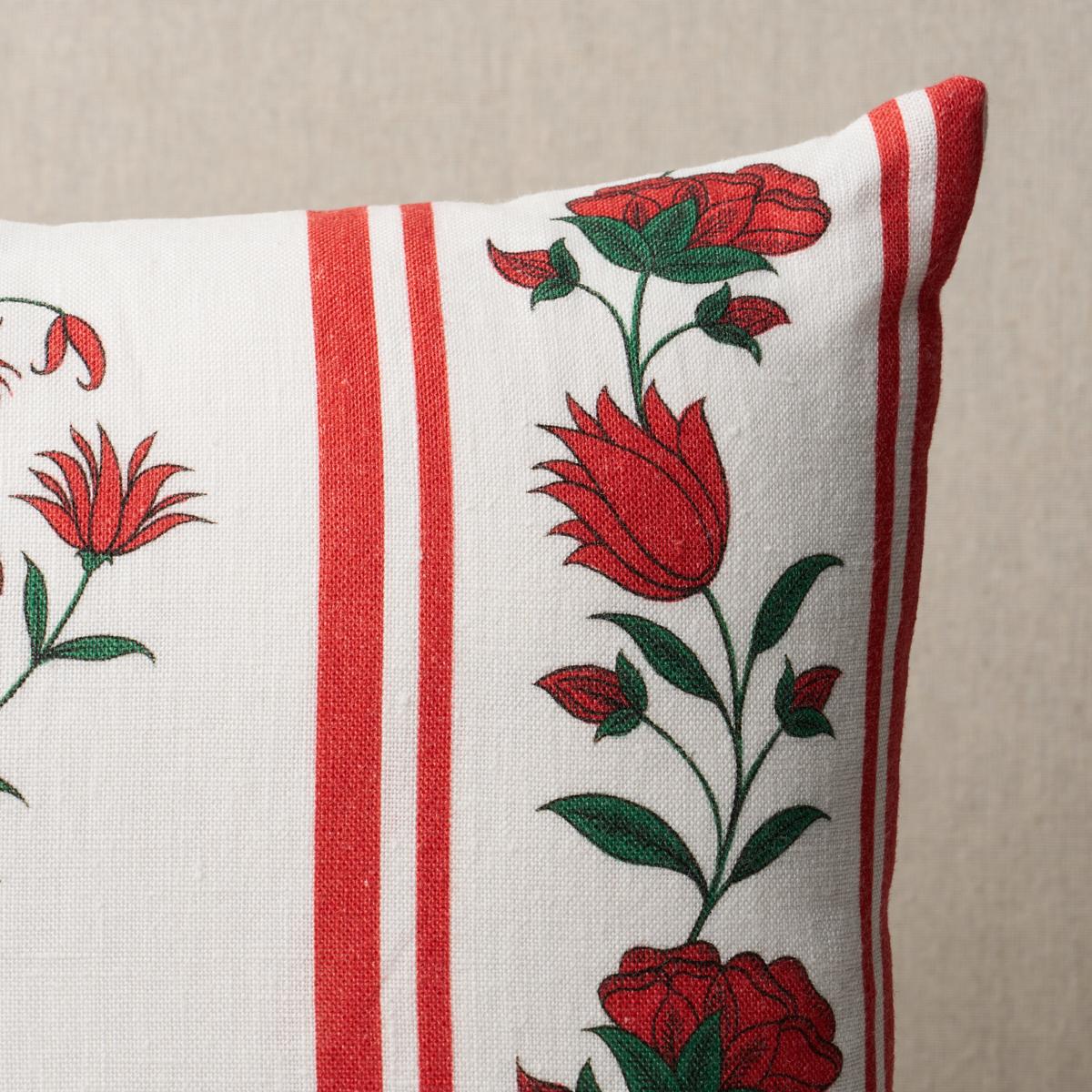 This pillow features Royal Poppy Stripe by Marie-Anne Oudejans for Schumacher with a knife edge finish. Inspired by Dutch simplicity and traditional Indian flower motifs, Jaipur, India–based decorative painter Marie-Anne Oudejans created Royal Poppy