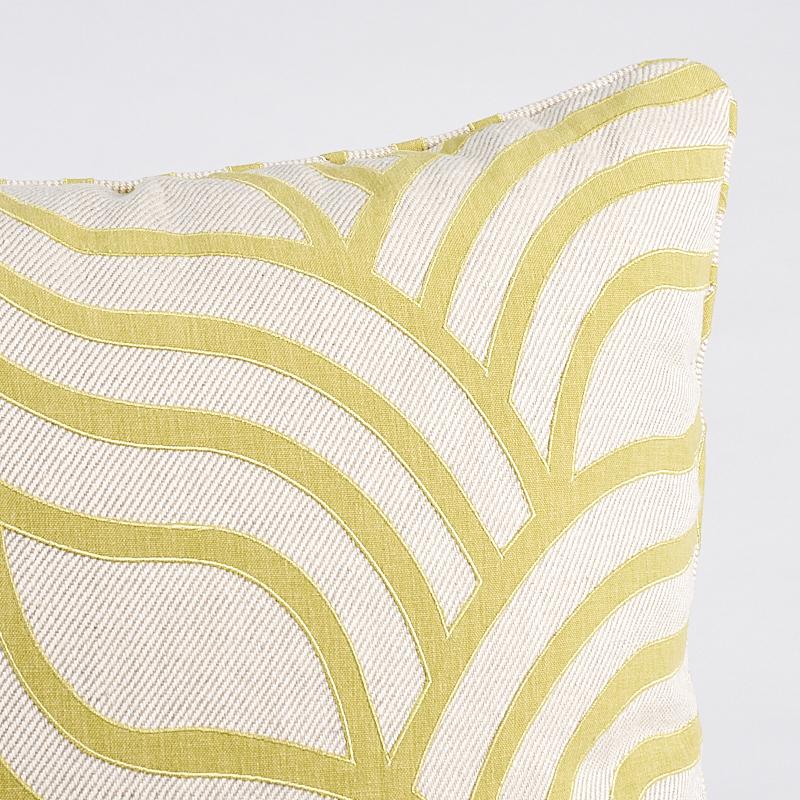 This pillow features Sangomar Applique with a self welt finish. Curvaceous, undulating lines of appliqu√© create a striking contrast with a chunky, solid twill ground for a laid-back look that still has a lot of drama. Pillow includes a feather/down