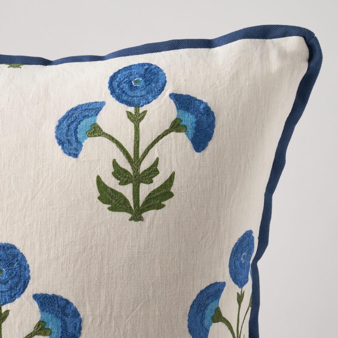 This pillow features Saranda Flower and is finished with a flange in Langham High Performance. Inspired by traditional Indian hand-block designs, this royal-colored Saranda Flower Embroidery features stylized flowers handprinted on a linen-ground