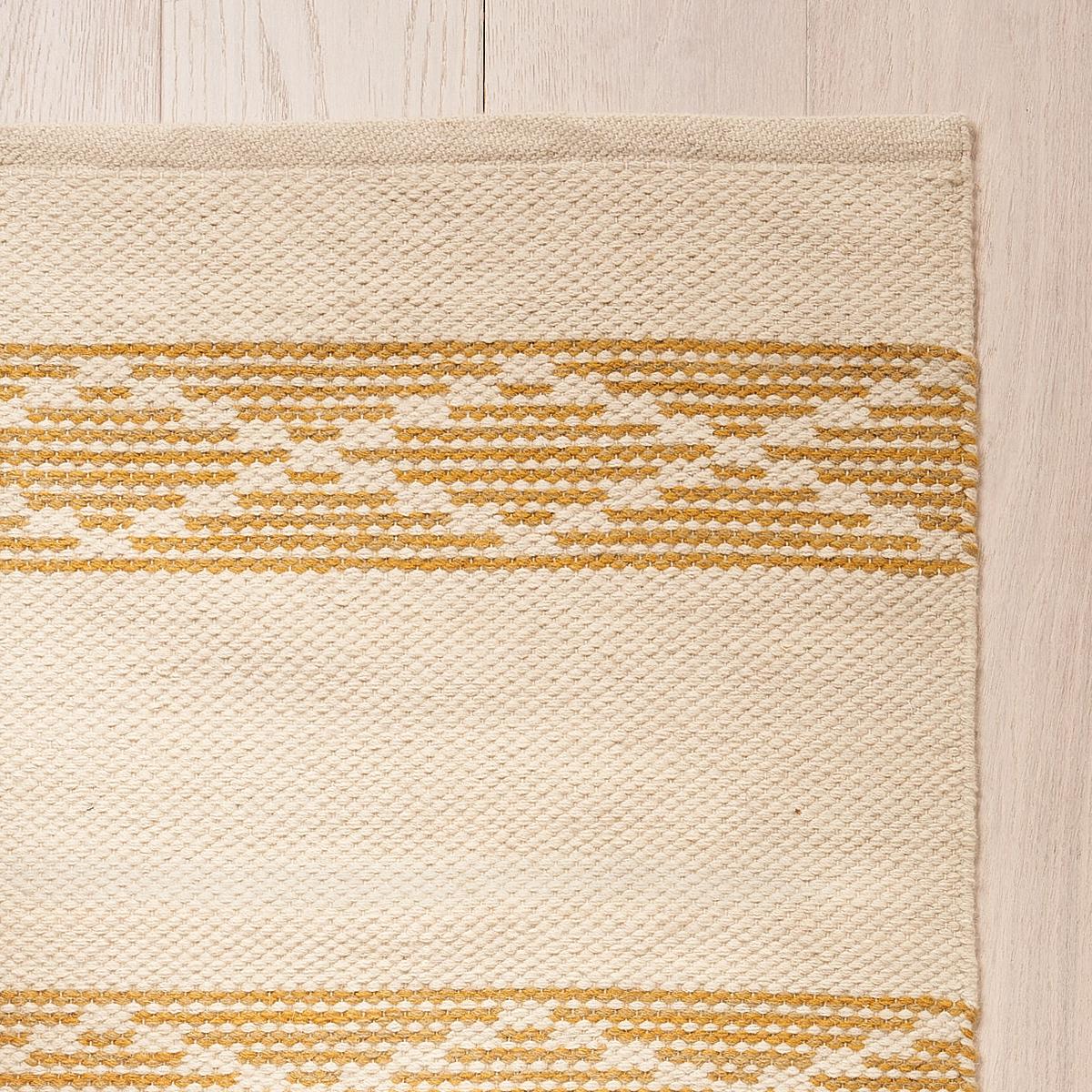 This rug will ship in December. A tight, stable weave of wool and cotton, Sequoia Stripe is a versatile geometric pattern with a unique lattice detail. Inspired by our popular Sequoia Stripe fabric and wallpaper designs, it has an understated,