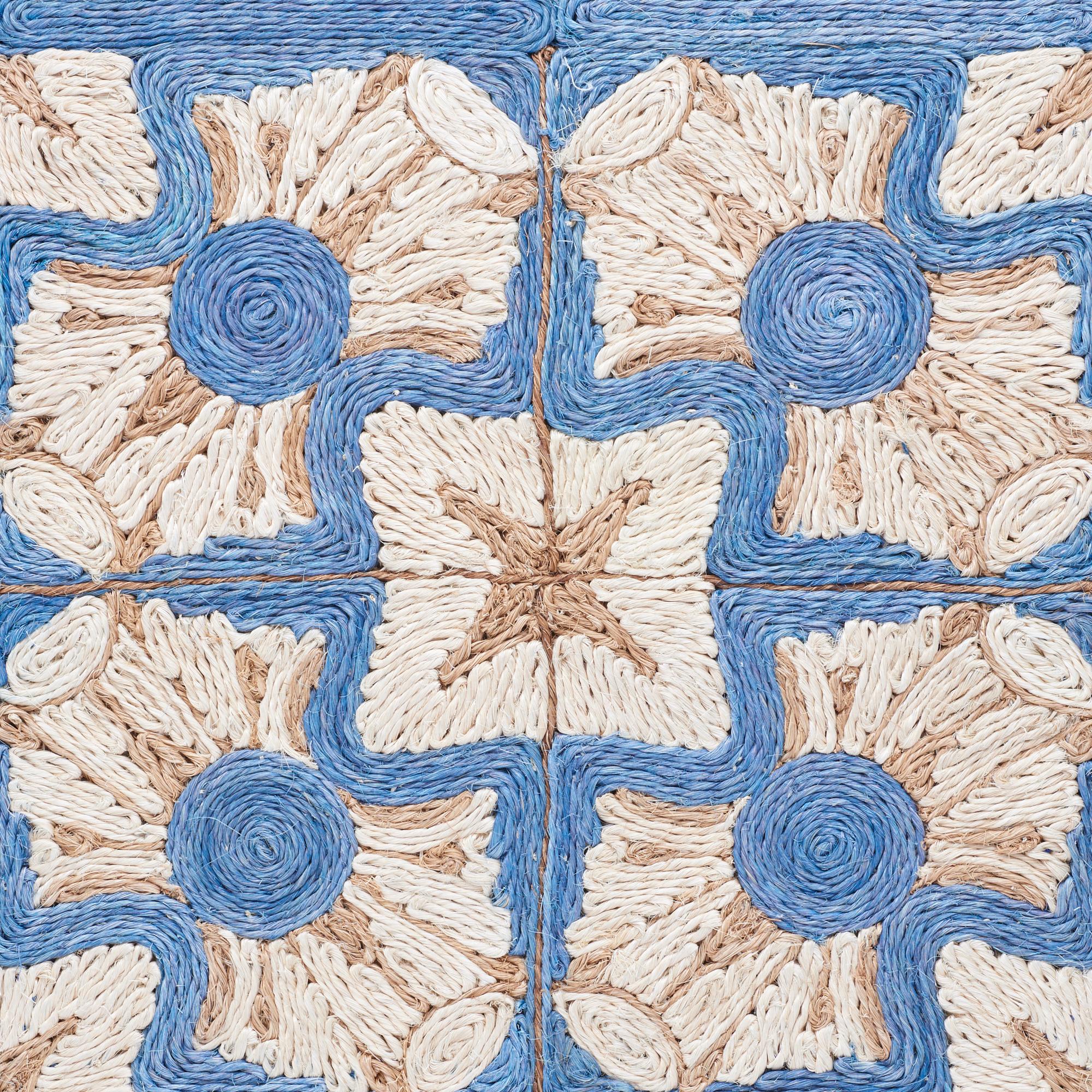 Inspired by graphic Art Deco motifs, the Raleigh collection features a fabulous range of hand-coiled abaca designs with unparalleled artistry and incomparable quality. From tonal geometrics to colorful medallion patterns, these extraordinary