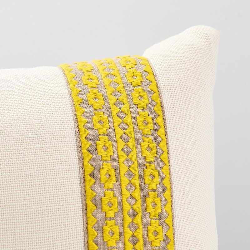 This pillow features Talitha Tape (item# 70645, TALITHA TAPE) with a knife edge finish. Inspired by a document in our archives, this tape brings the appeal of graphic, ethnic embroideries to contemporary decorating in a range of happy, usable hues.