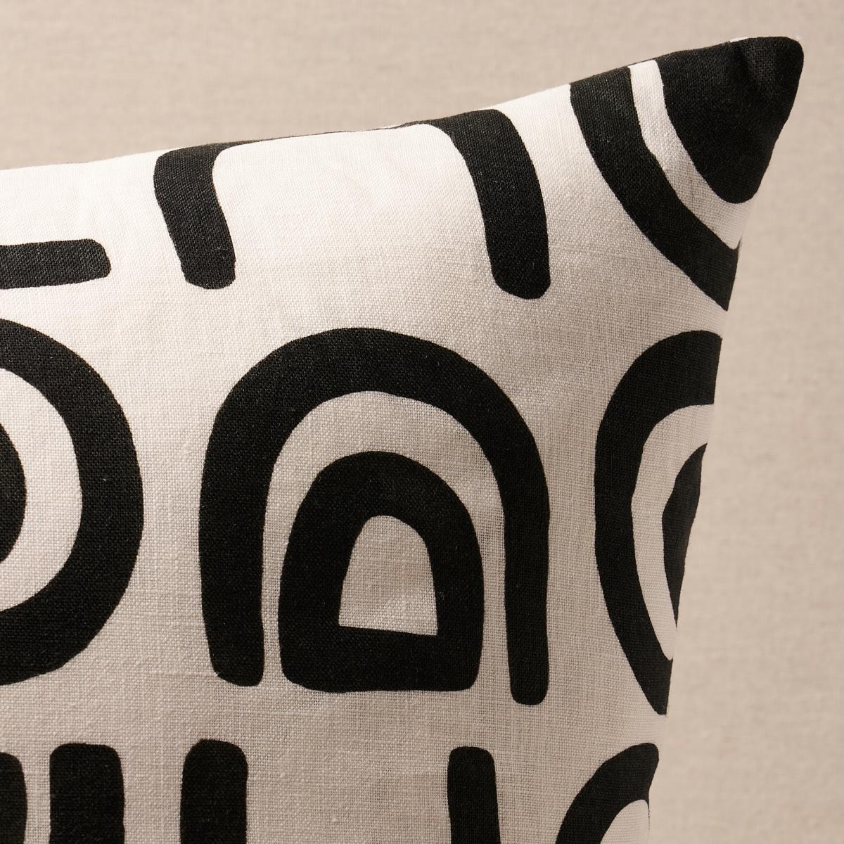 This pillow features Threshold Printed Linen by Hadiya Williams for Schumacher with a knife edge finish. Based on original hand-painted artwork, Hadiya Williams’ Threshold Printed Linen in carbon incorporates simple abstract elements into a lively