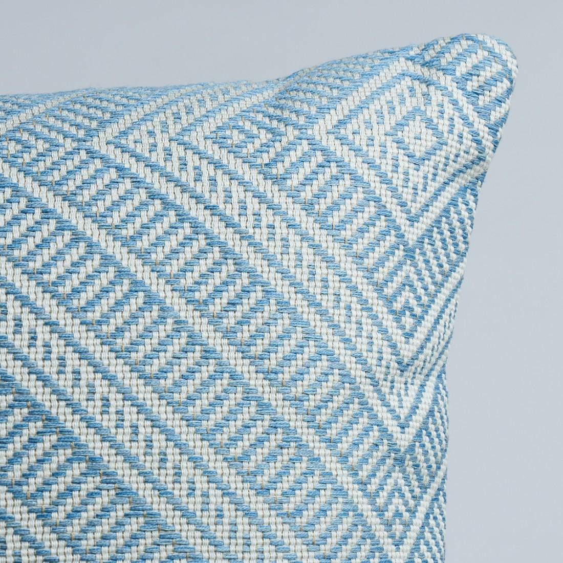 This pillow features Tortola with a Knife Edge finish. Inspired by basket designs, this concentric diamond pattern is woven from Dralon acrylic yarns. Textured and extremely durable, it is suitable for both indoor or outdoor settings. Pillow