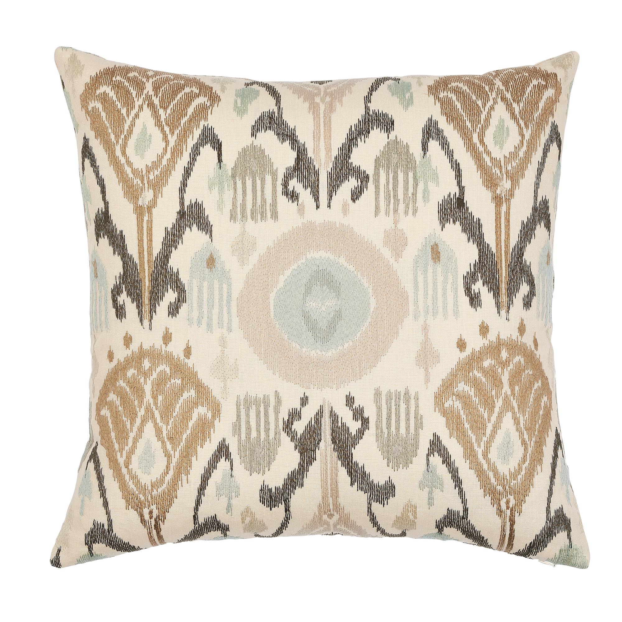 This pillow features Turkestan Embroidery with a knife edge finish. Inspired by a silk ikat from Central Asia, this embroidered pattern is a contemporary take on a classic design. Satin stitches create a wonderfully graphic and dimensional pattern.