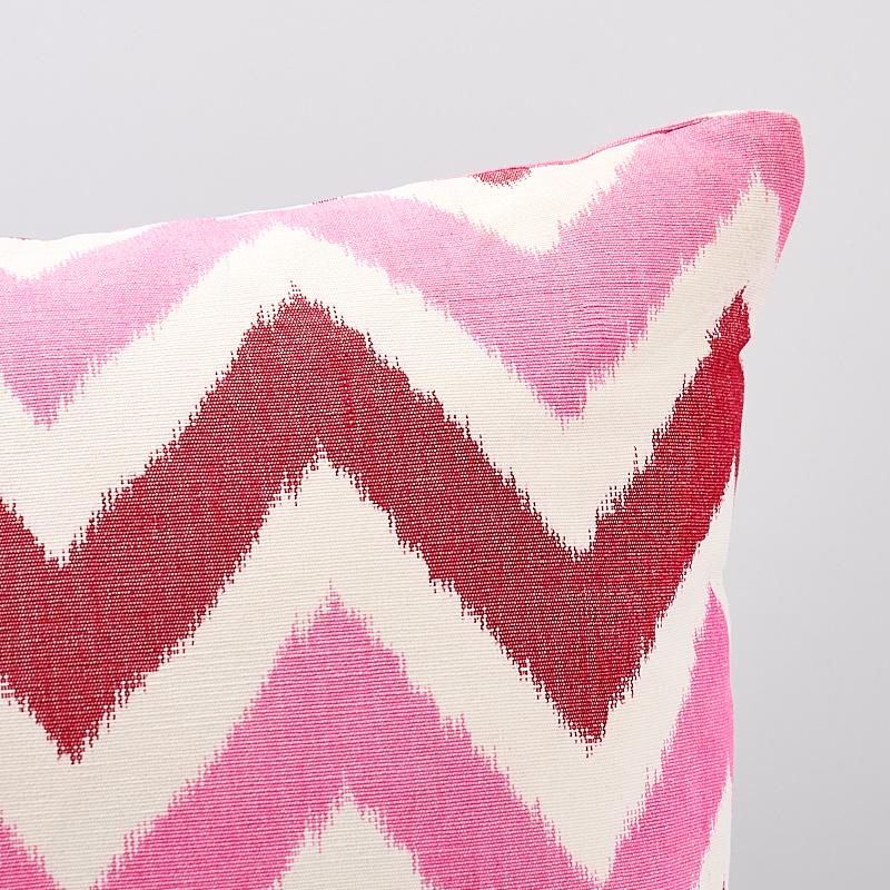 This pillow features Vedado Ikat (Item# 79461, VEDADO IKAT FABRIC) with a knife edge finish. This happy ikat chevron stripe is a best-of-both-worlds combination featuring two go-to design staples in a great, use-everywhere scale. Pillow includes a