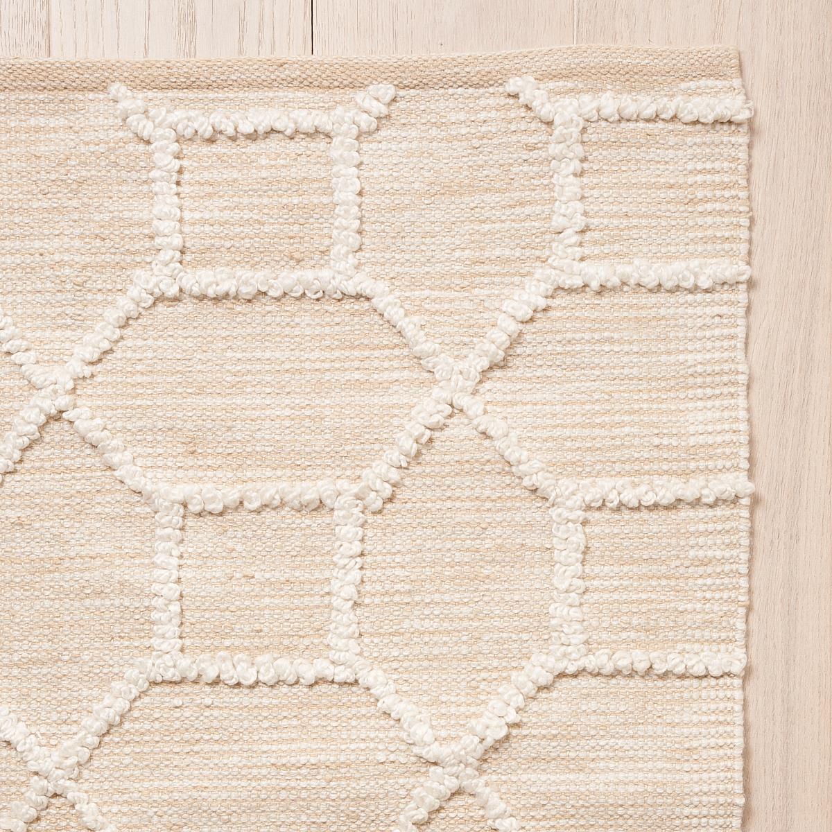 This rug will ship in December. Made of soft yet super-durable PET, Vento is as stylish as it is practical. Inspired by our Vento Embroidery fabric, this large-scale lattice design has fabulous texture and tonal variations. Equally at home indoors
