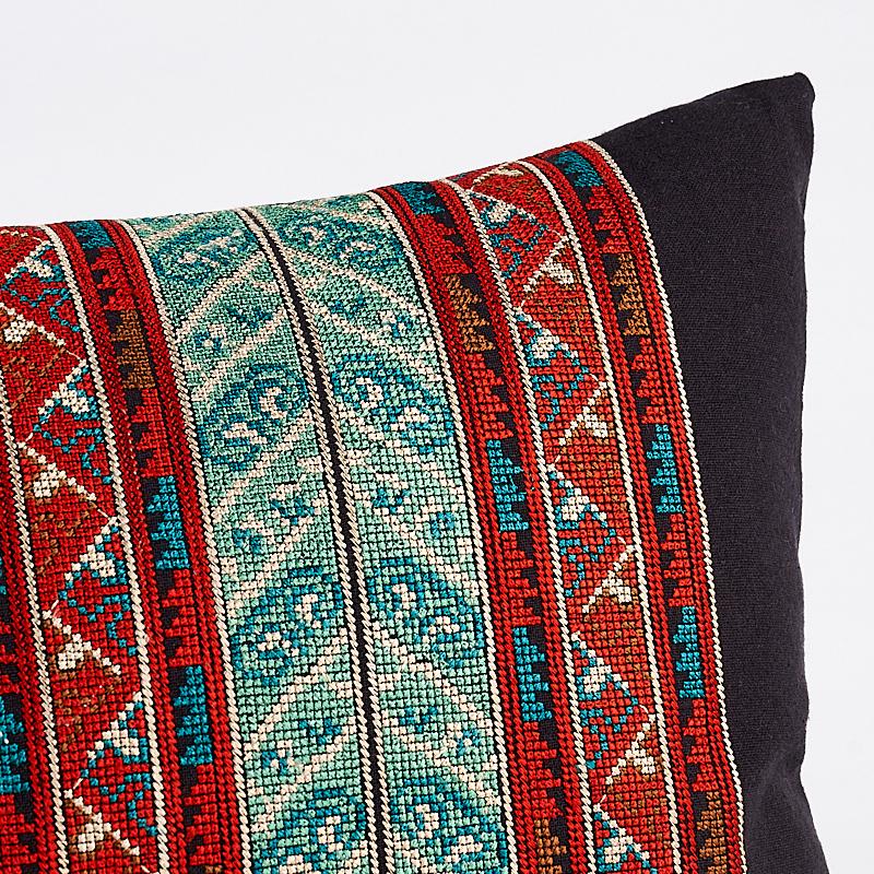 This pillow features Vinka Embroidery with a knife edge finish. Vinka‚Äôs wide vertical stripes are ornately embroidered with a highly detailed, densely patterned cross-stitching for a lavish, multicolored effect. Pillow includes a feather/down fill