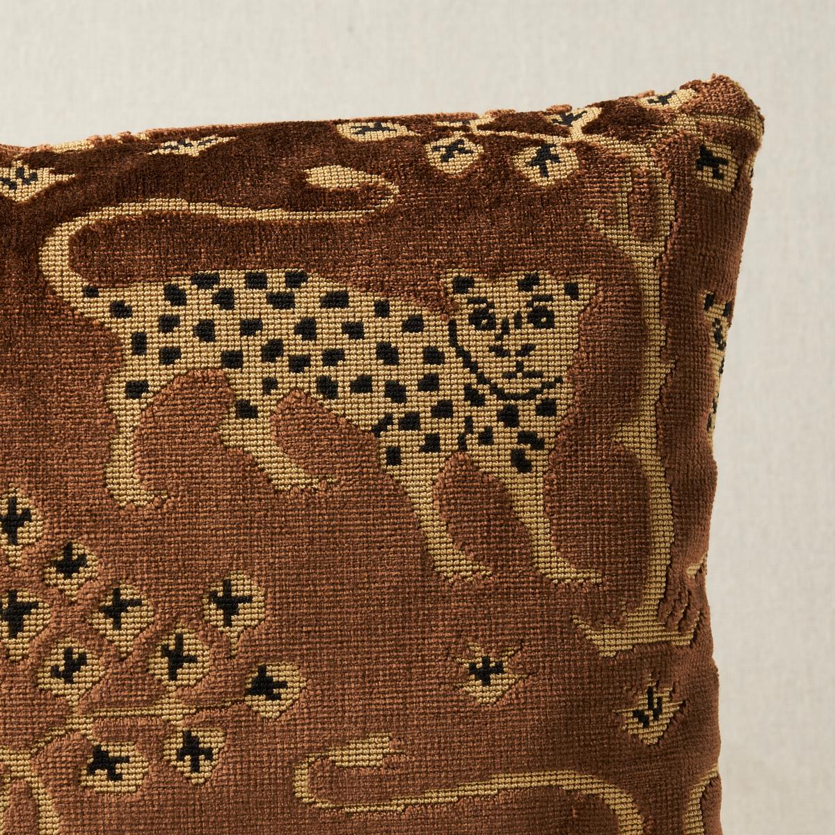 This pillow features Woodland Leopard Velvet with a knife edge finish. A host of historic paintings and textiles served as source material for this fabulously stylized leopard and tree motif. The midscale mirrored repeat design combines loop-and-cut