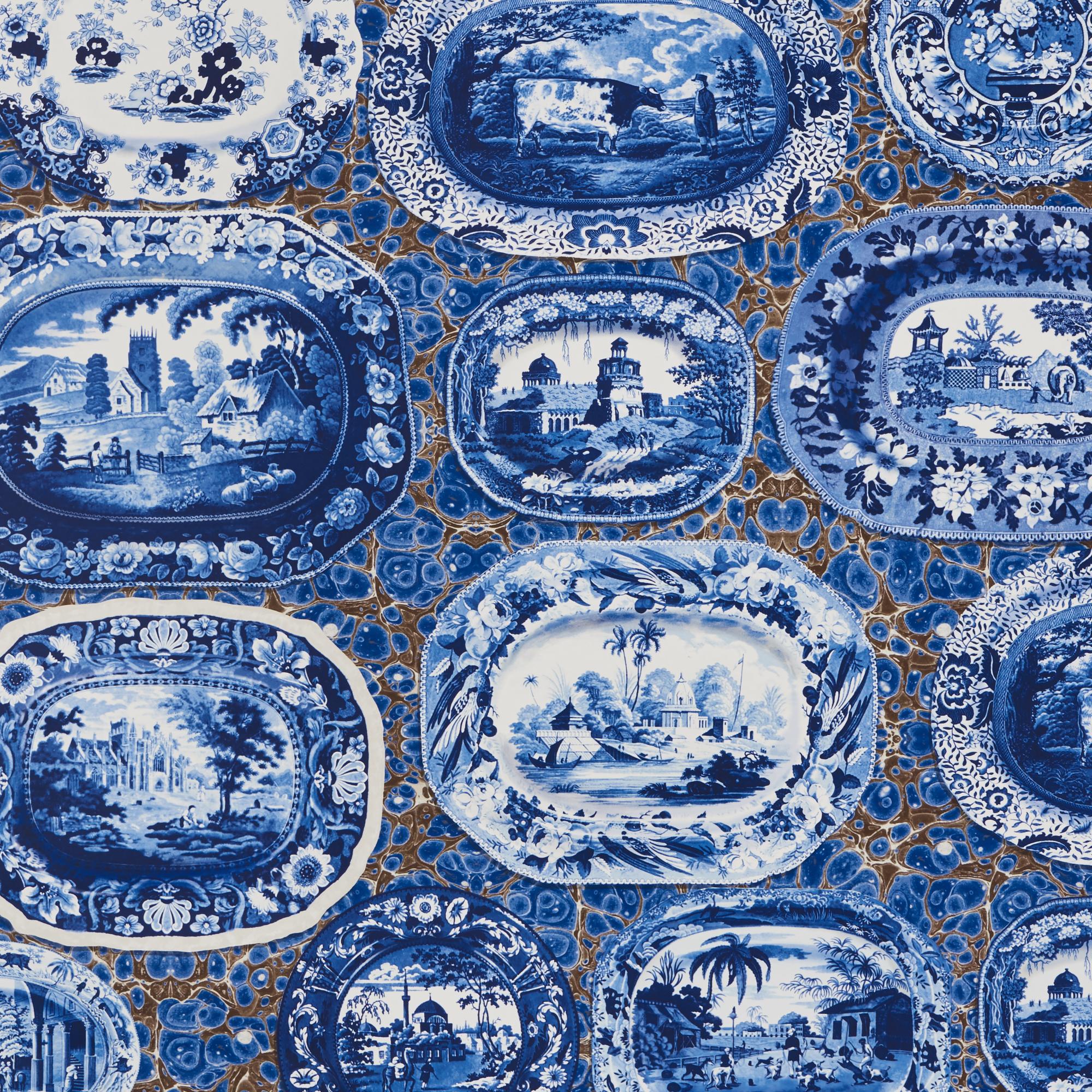 A trompe l’oeil pattern of transfer ware serving dishes mounted on a marbleized backdrop creates the ultimate layered illusion and instant drama, no hammers or nails required.

Since Schumacher was founded in 1889, our family-owned company has