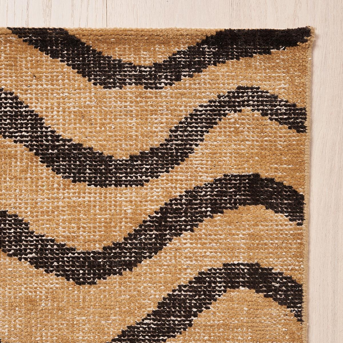 This rug will ship in December. A wildly chic hand-knotted design made of wool and cotton, Zebre features a large-scale abstract animal pattern. Inspired by our popular Ze’bre Epingle fabric, this is a fabulously versatile graphic design that never
