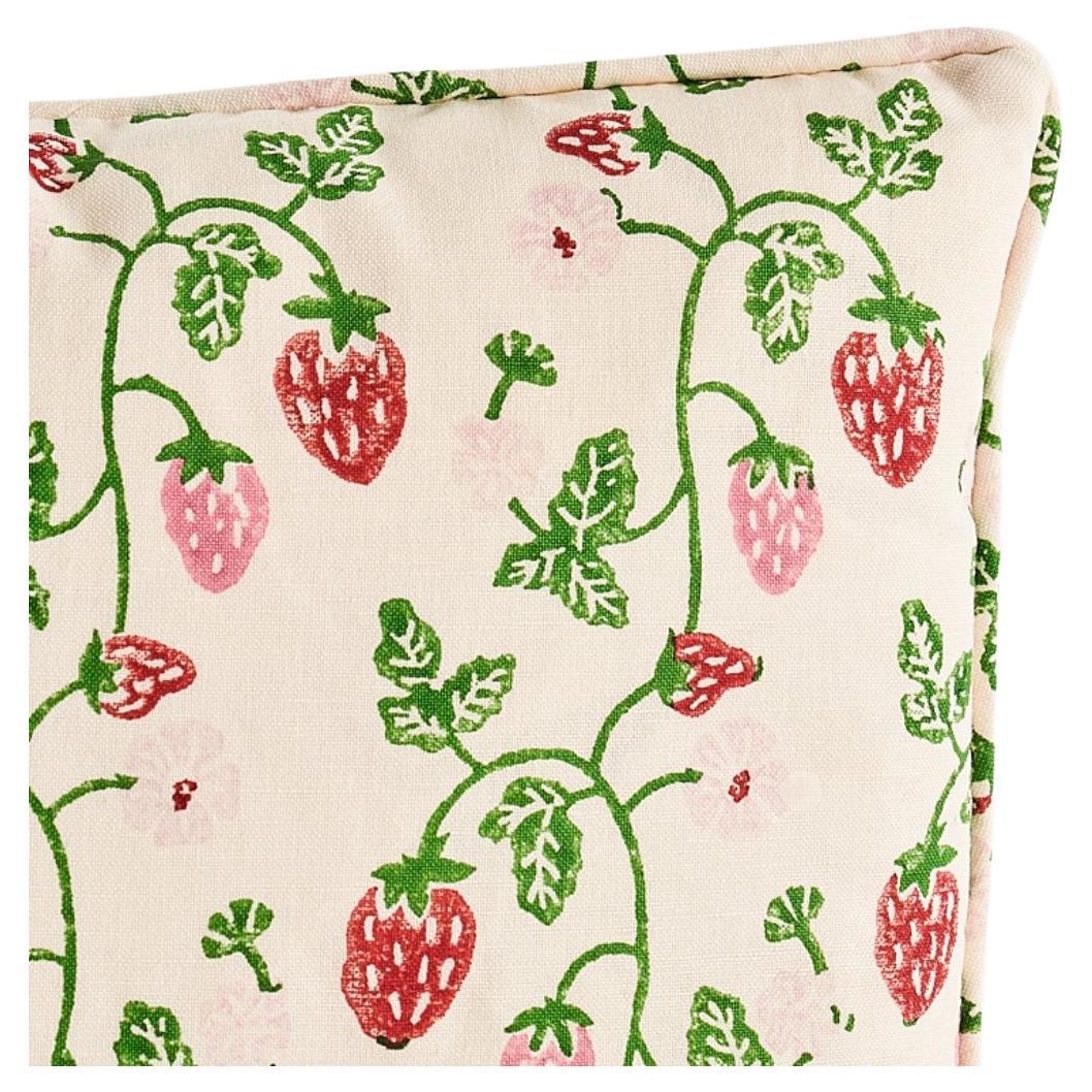 This pillow features Strawberry by Molly Mahon for Schumacher with a self welt finish. A grass-colored cotton-linen blend fabric, Strawberry features a rambling pattern of wild strawberries that speaks to tradition, nostalgia and British charm.