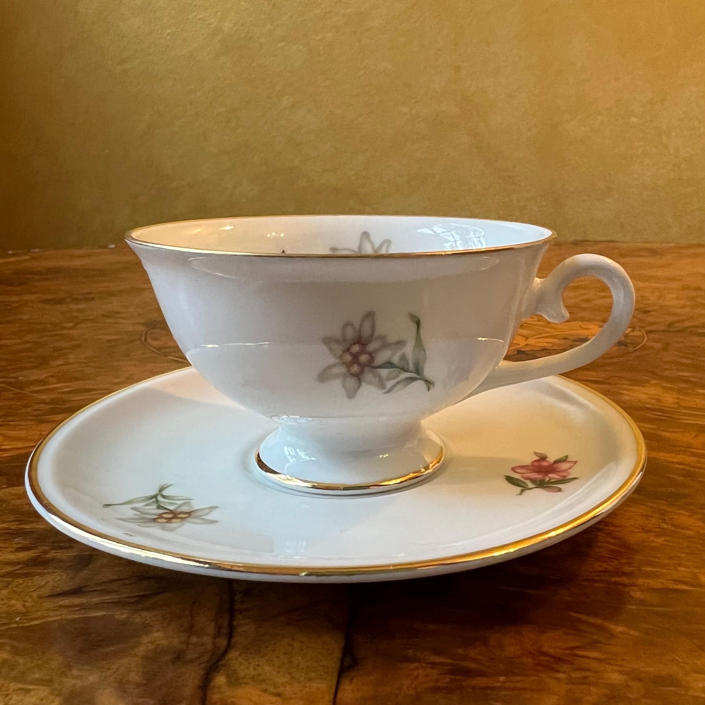 Floral print with gold trim, some ware to gold trim, stamped Schuman Arzbery

Material: Bone China

Country Of Origin: Germany 

Measurements

Tea Cup: 4cm high, 9.5cm length, 7.5cm width

Saucer: 11.5cm diameter