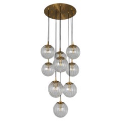 Schwung Globe Cluster 10 Modern Brass and Glass Chandelier